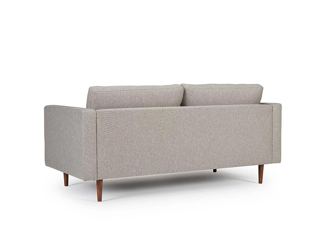 The Clasico 2.5 Seater Sofa emanates a classic mid-century Scandinavian modern design, adding a timeless touch to any setting. As an OEM product, it offers a variety of wood finishes for the legs and fabric or leather options for the upholstery,