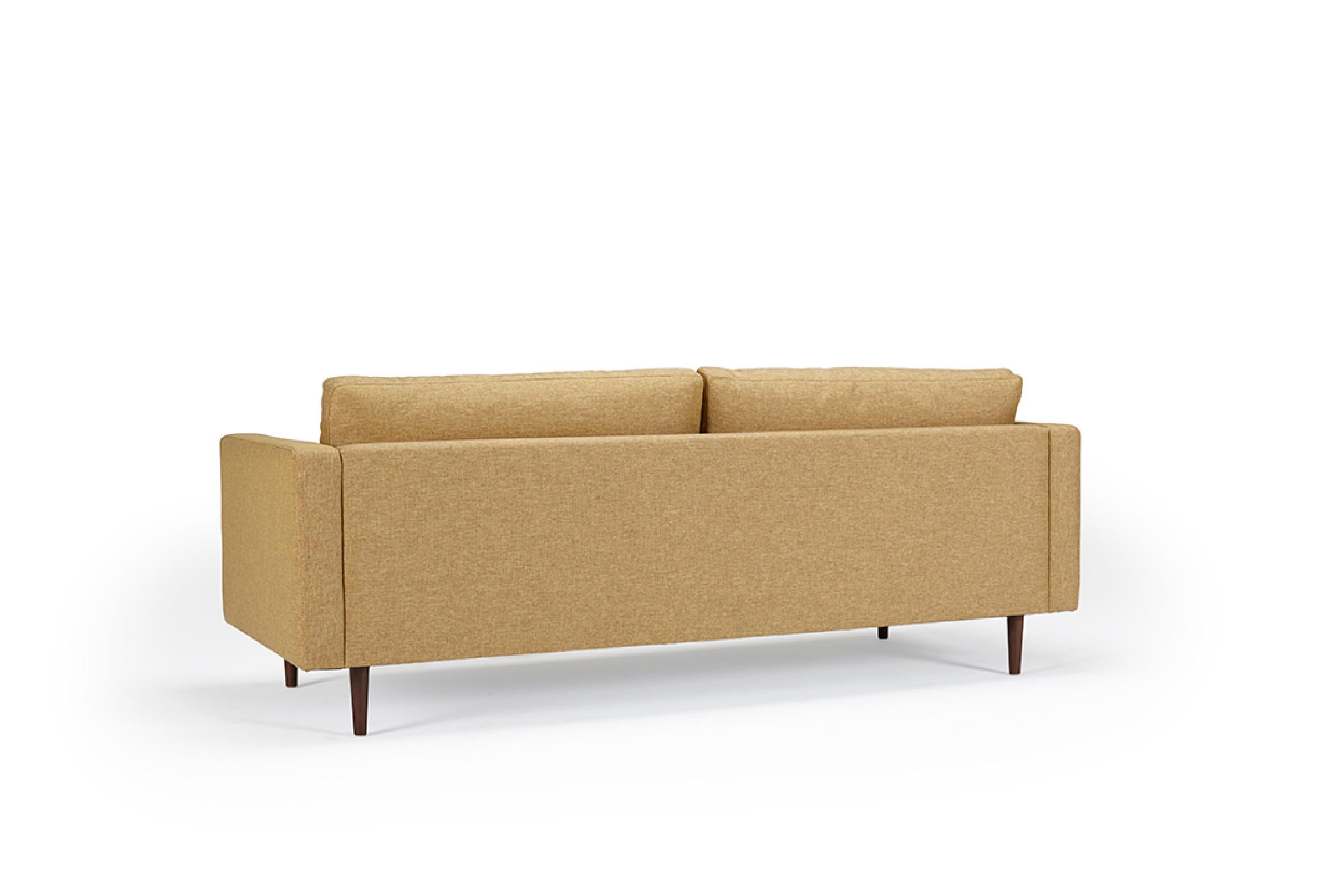 Channeling a classic mid-century Scandinavian modern design, the Clasico 3 Seater Sofa effortlessly combines timeless aesthetics and contemporary comfort. As an OEM product, it presents various wood finishes for the legs and a selection of fabric or