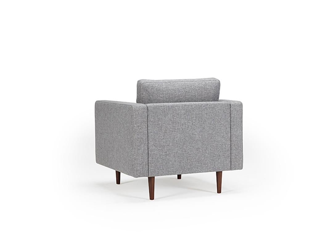 Drawing inspiration from mid-century Scandinavian modern design, the Clasico Armchair combines timeless aesthetics with exceptional comfort. As an OEM product, it allows for customization with various wood finishes for the legs and a selection of