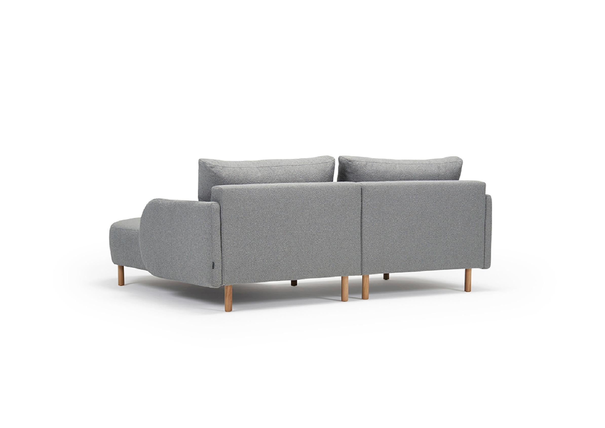 Embodying contemporary design aesthetics, the Paleta Chaise+1 Sofa combines clean lines and gentle forms. As an OEM product, it offers black metal or oak lacquered legs along with a wide selection of fabric or wool finishes for the upholstery,