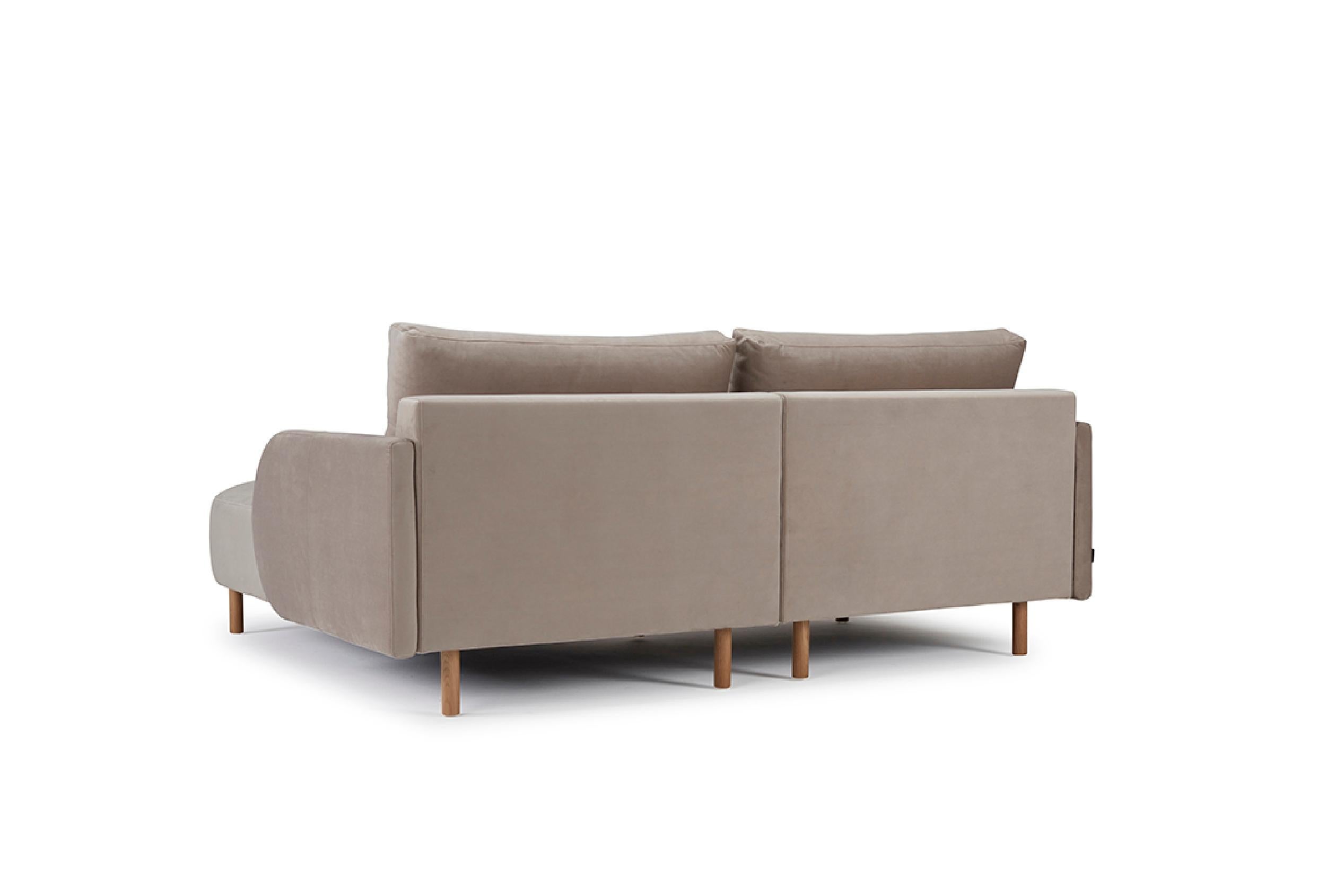 Embodying contemporary design aesthetics, the Paleta Chaise+1 Sofa combines clean lines and gentle forms. As an OEM product, it offers black metal or oak lacquered legs along with a wide selection of fabric or wool finishes for the upholstery,