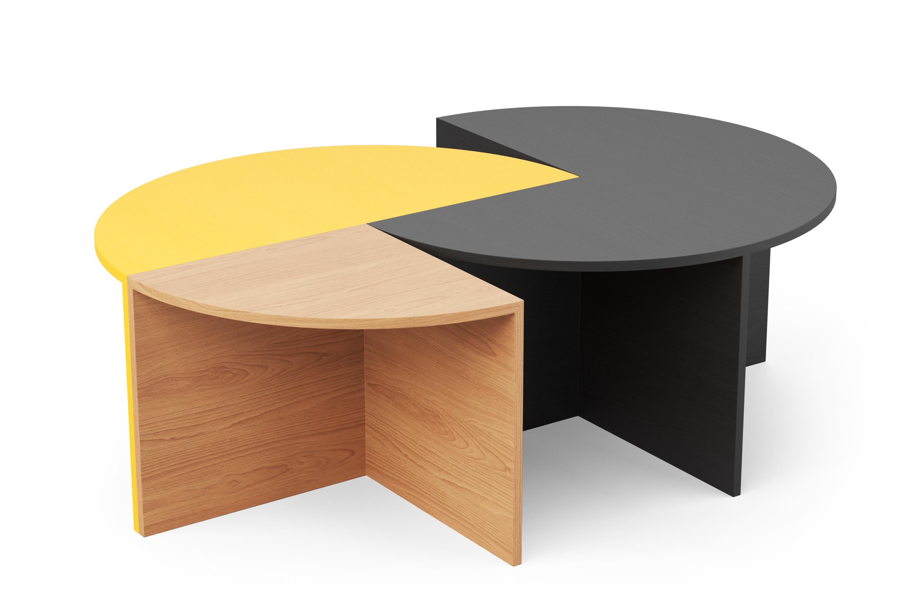 This is an ingenious modular side- or coffee-table system that can be built up from three different units: a quarter circle, a half circle and a three-quarter circle. The different modules are all compatible and can be combined together — making