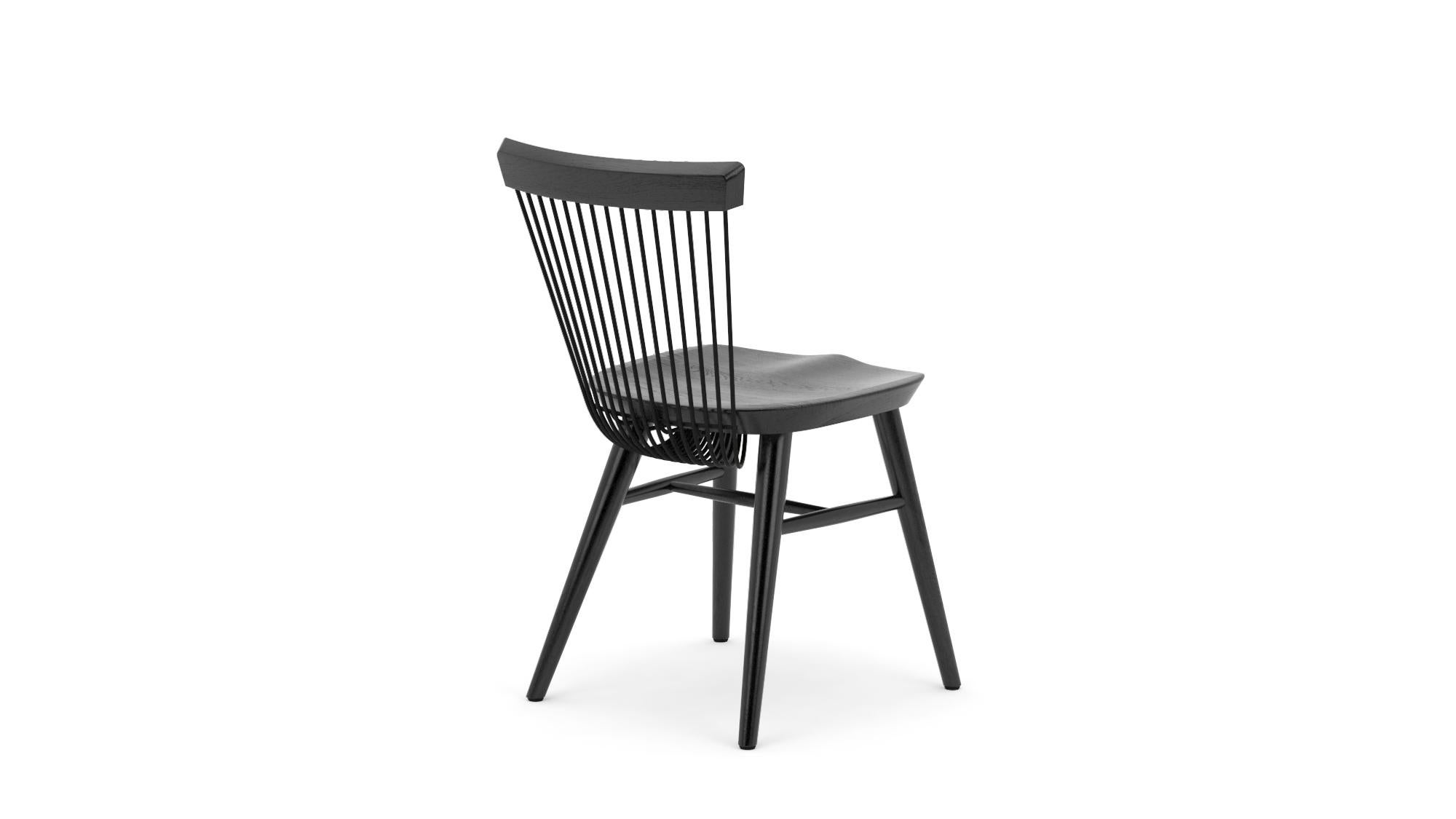 Based on a modern Windsor design, the WW Chair, where the first 'W' stands for Windsor and the second for Wire is an iconic piece of furniture. Produced from solid oak with the unique 'wire' backrest formed from mild steel rods which are delicately
