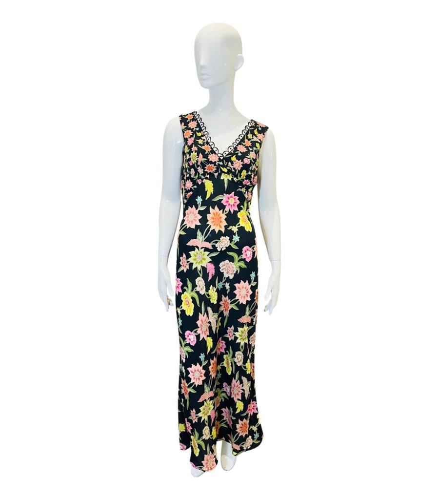 Brand New - Hayley Menzies Silk Floral Maxi Dress
Black slip dress designed with all-over multicoloured floral print.
Detailed with crochet trimmed cross-over V-Neckline to the front and rear. Rrp £400
Size – XS
Condition – Brand New, With