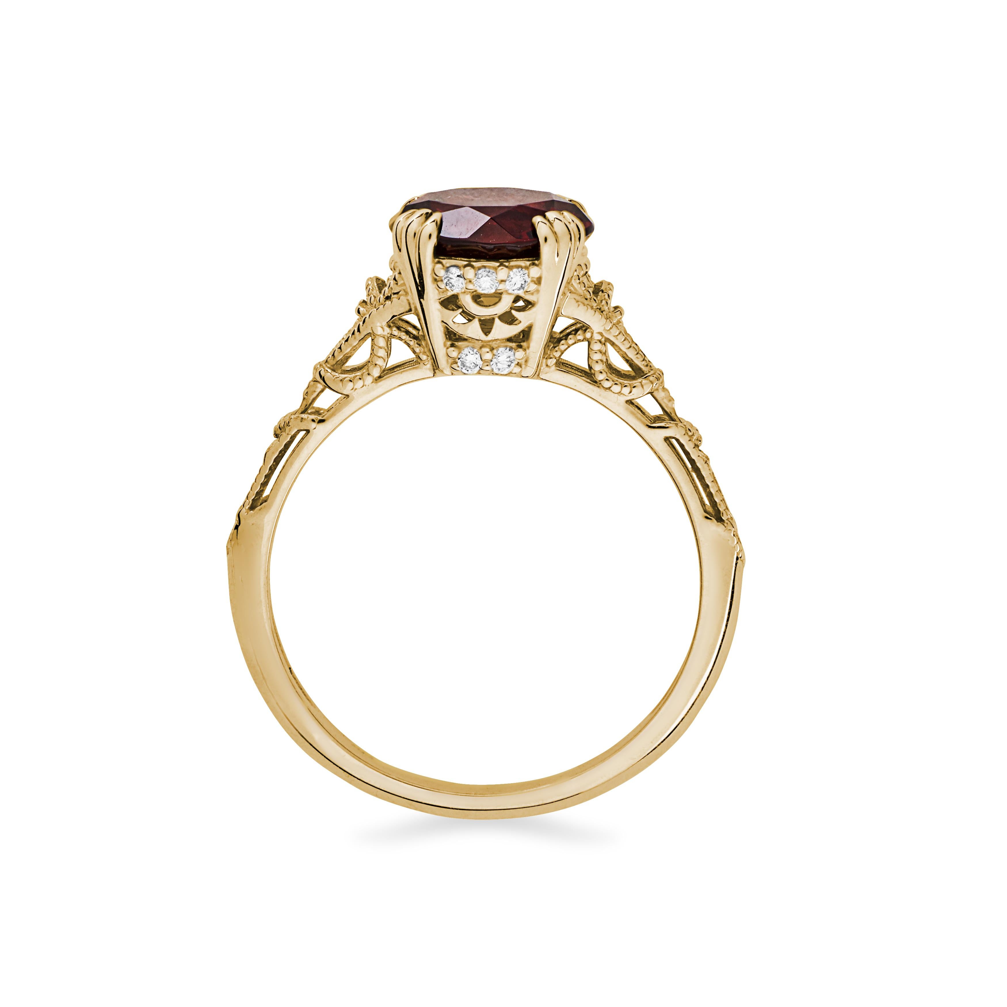 Five diamonds climb each side or this 14K gold ring, with rope and milgrain detailing in the band. Original, intriguing, and fabulous.

Materials + Dimensions: 14k yellow gold, 8.2mm garnet center stone, .08ctw VS G/H round diamond melee
