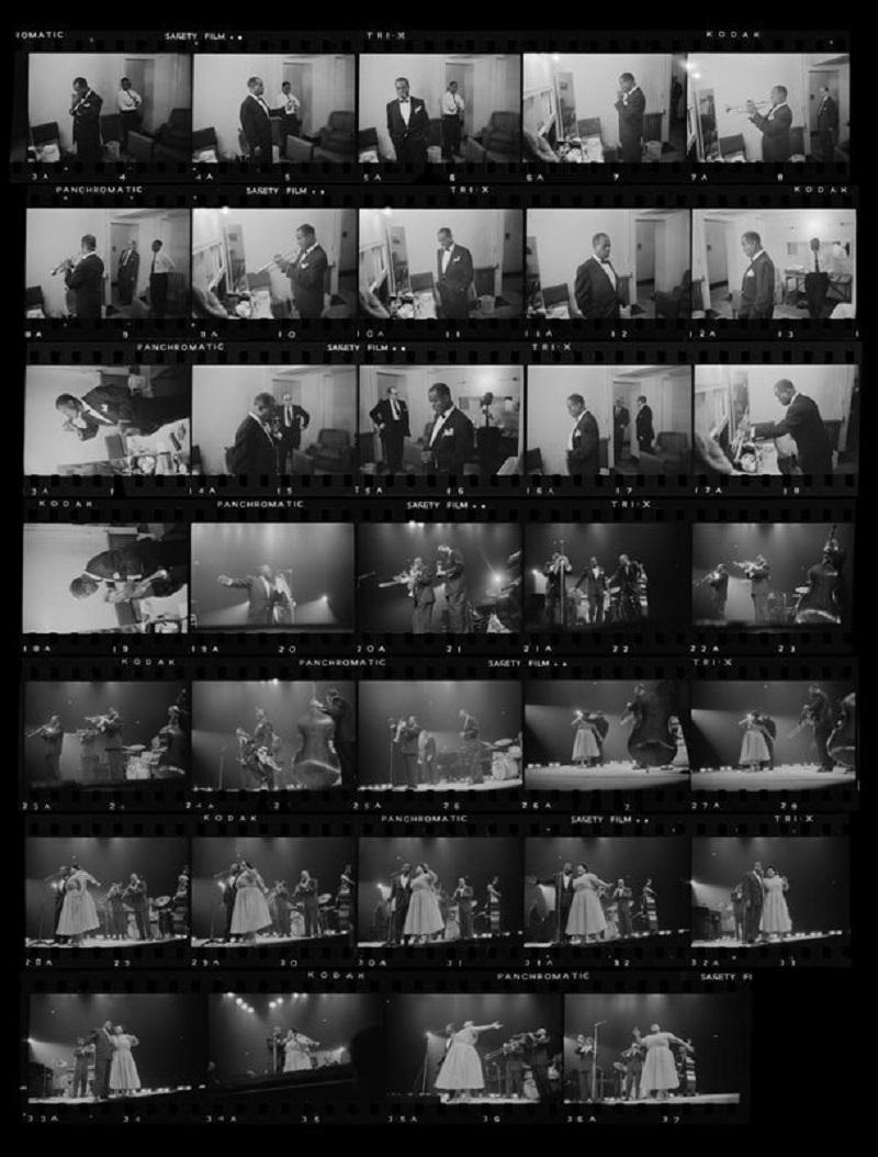"Satchmo Blows In" von Haywood Magee

Eine Reihe von Bildern zeigt den amerikanischen Jazztrompeter und Sänger Louis Armstrong (1900 - 1971) hinter der Bühne und bei einem Auftritt während einer britischen Tournee am 19. Mai 1956.