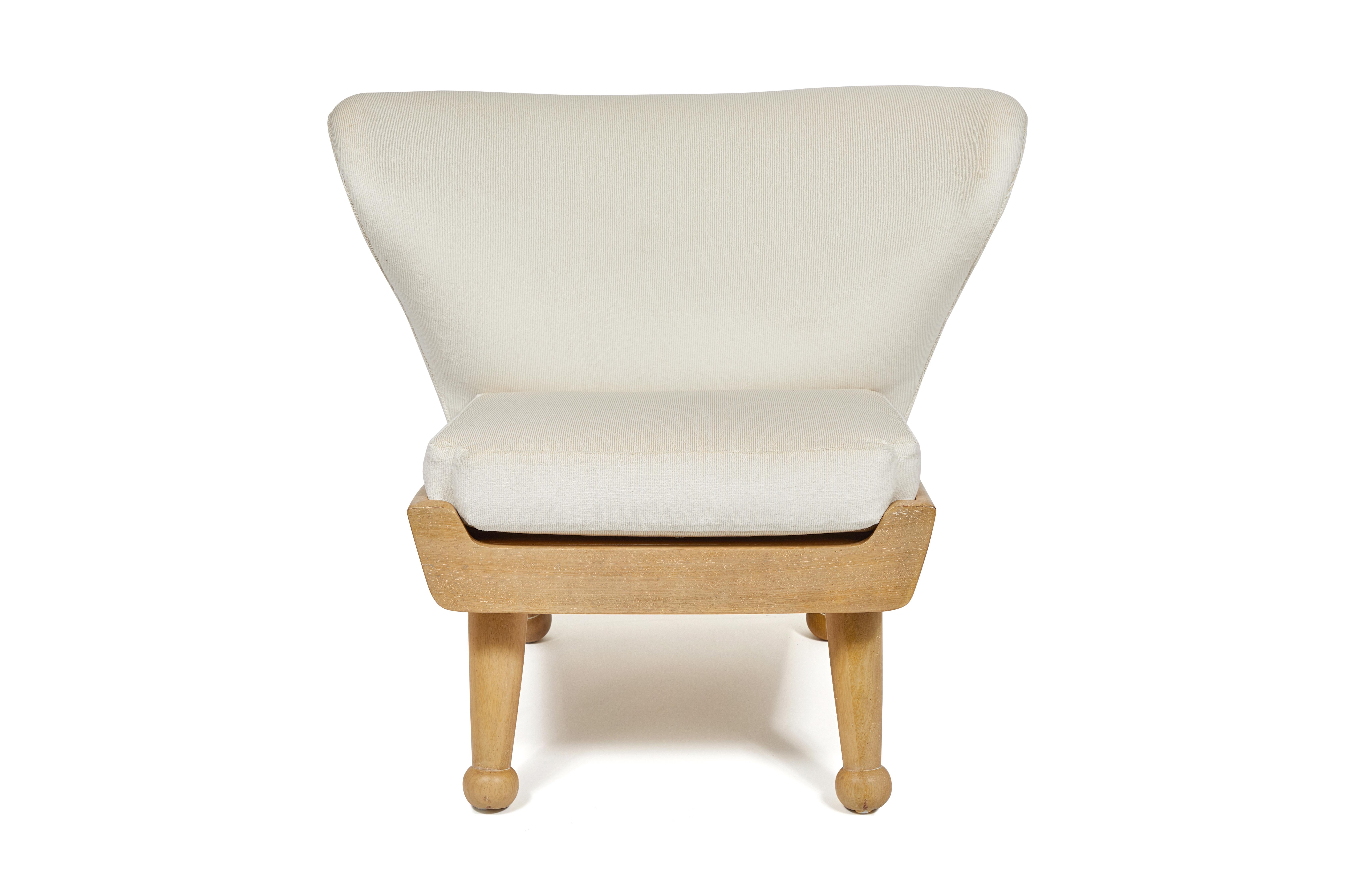 Our Hayworth lounge chair has a winged back and low-profile design. Offered here with our coordinated ottoman. Features upholstered back cushion and removable seat cushion, made of outdoor dry-fast foam. Base and legs are made of bleached & lightly