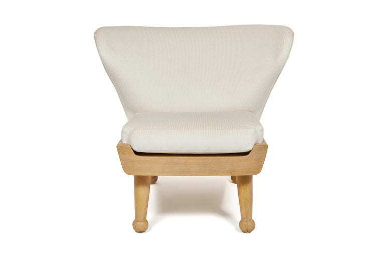Our Hayworth outdoor lounge chair has a winged back and low-profile design. Offered here with our coordinated ottoman. Features upholstered back cushion and removable seat cushions made of outdoor dry-fast foam. Base and legs are made of bleached &