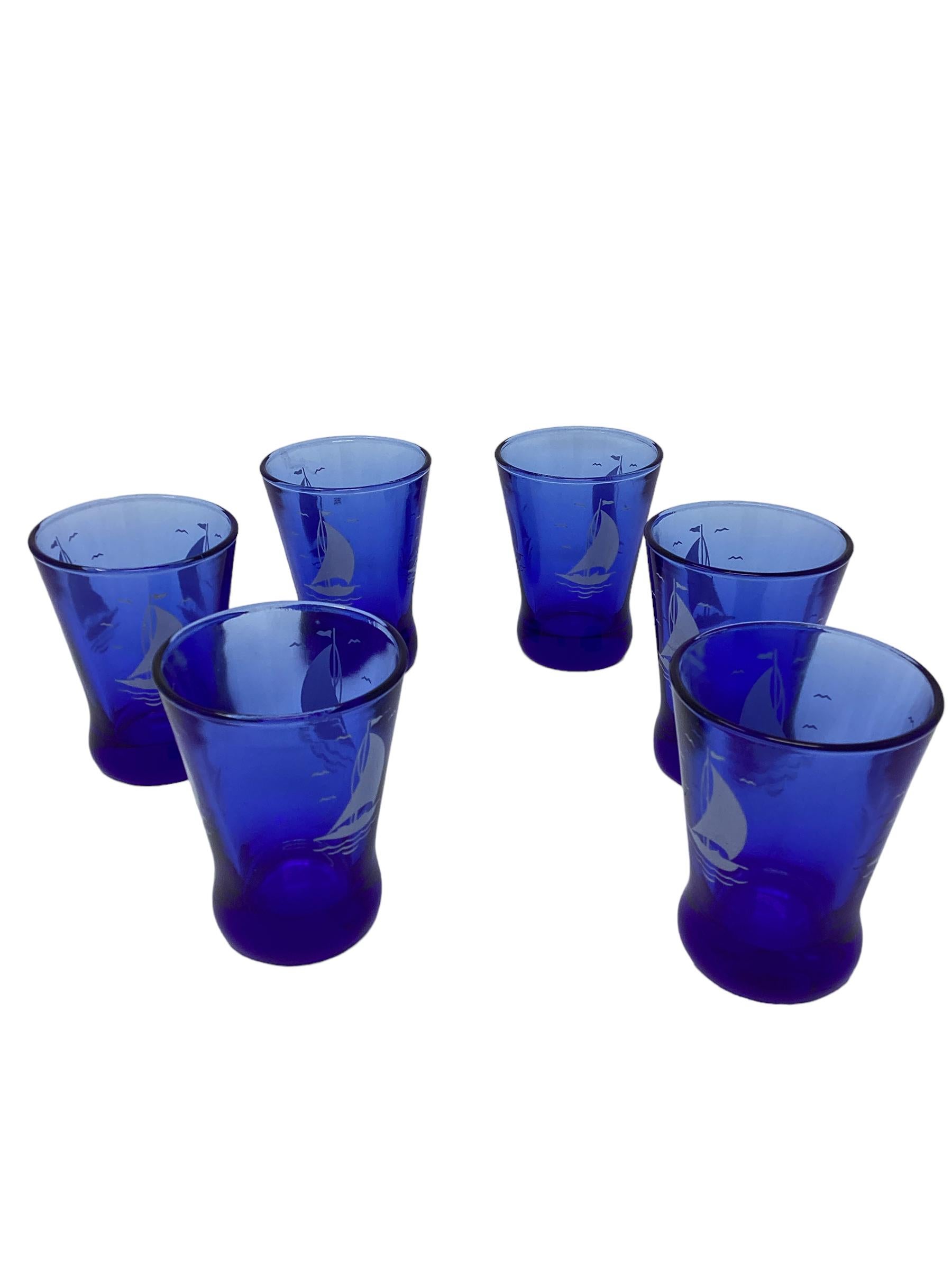 Hazel-Atlas Sportsman Series Cobalt Blue with White Sailboat Cocktail Set. The cocktail cups measure 2.5