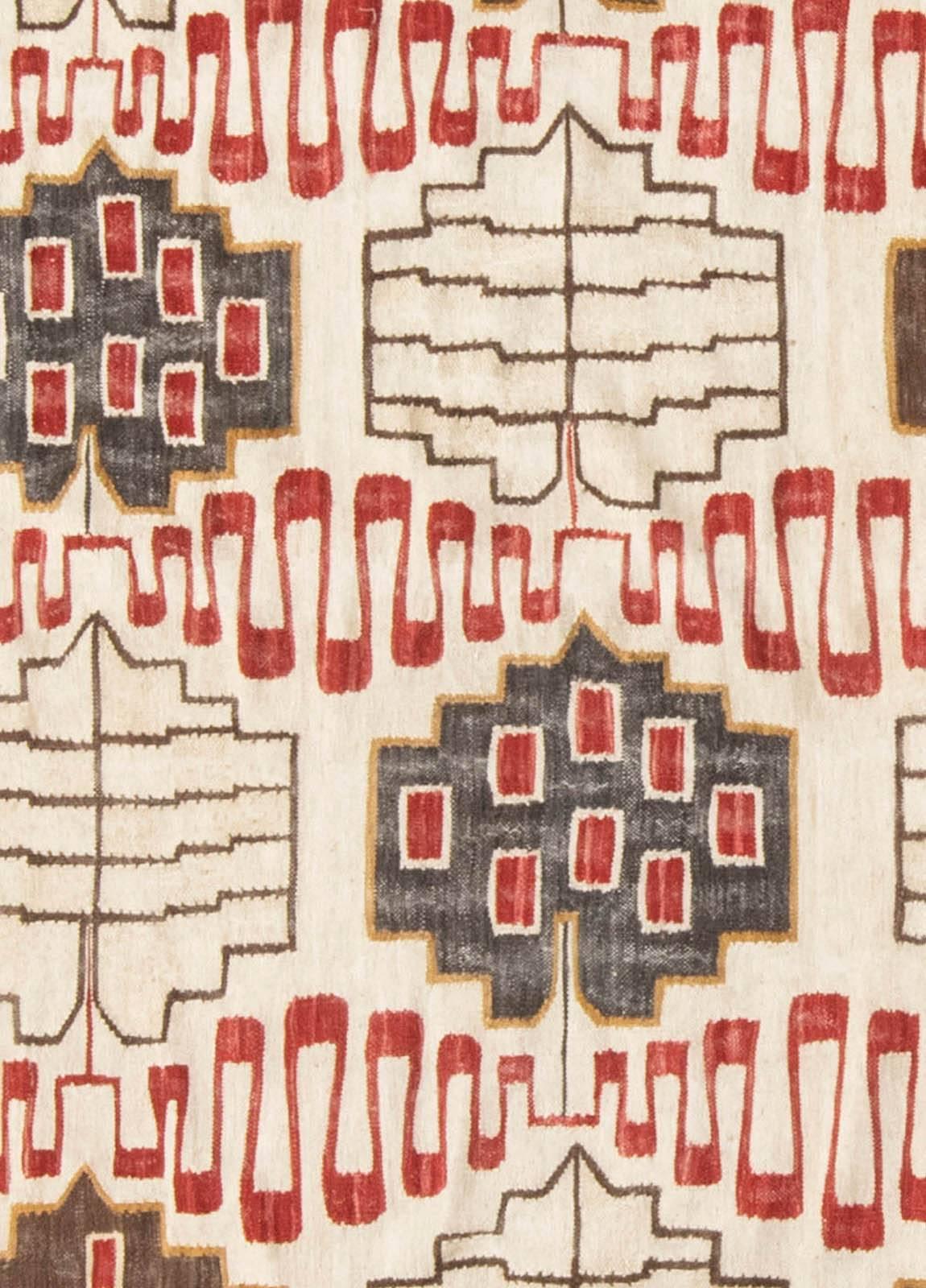 Handwoven flat-weave wool rug of Swedish design inspiration.