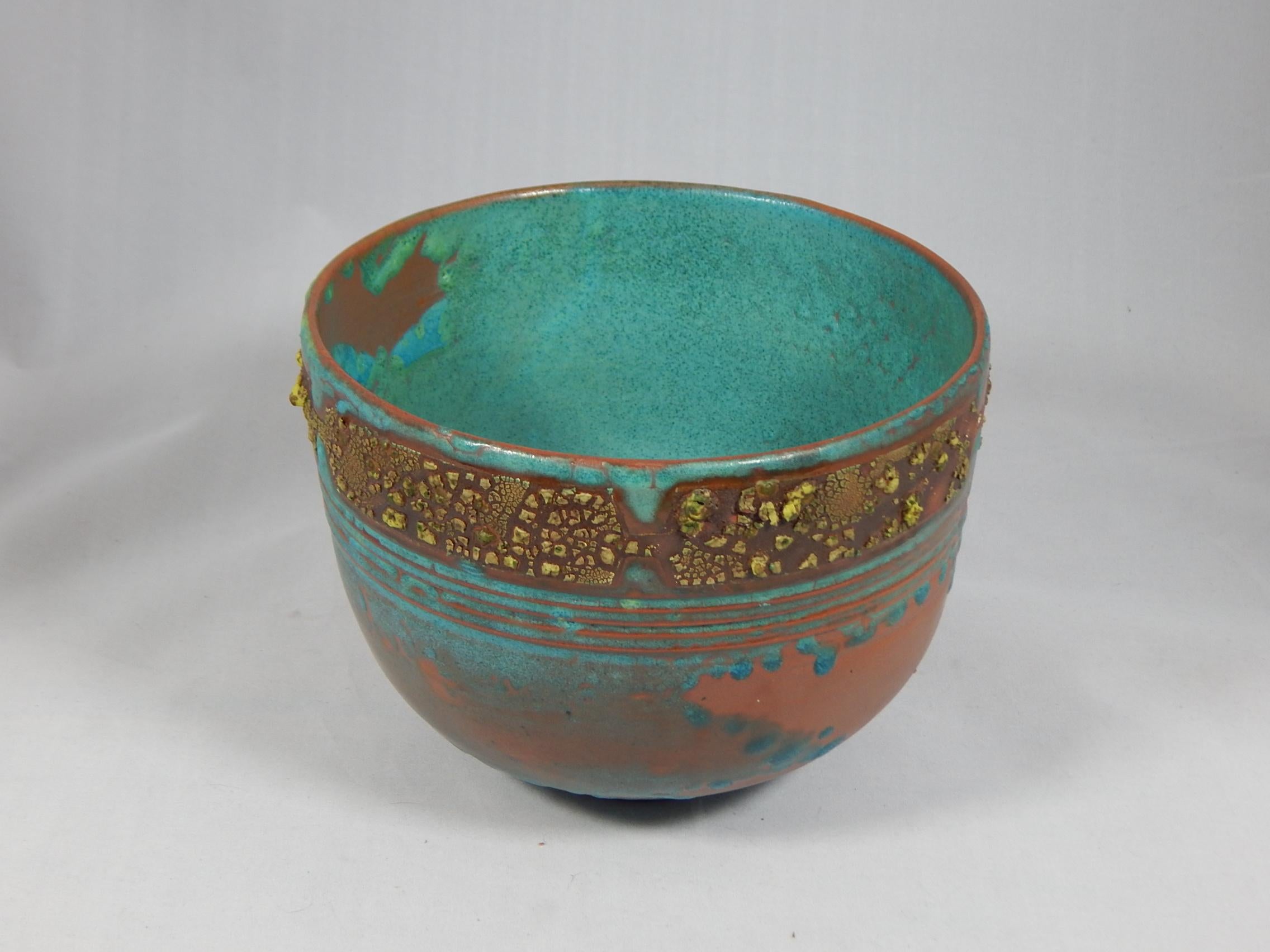 Wheel thrown Hazelhurst earthenware vessel by ceramicist Andrew Wilder.
This is a one of a kind object made in the ancient way- by hand in a small artisanal pottery. In this series Wilder explores the application of lichen under glazes to achieve