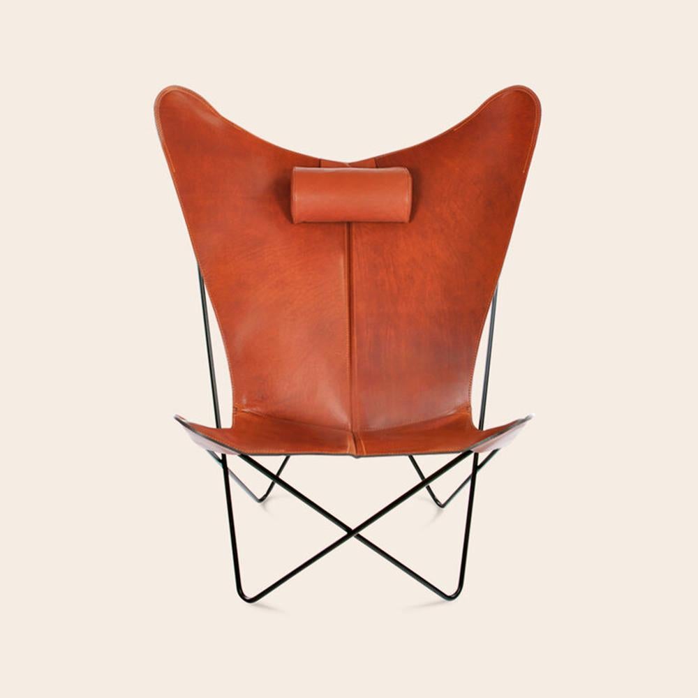 Hazelnut and black KS chair by OxDenmarq
Dimensions: D 80 x W 98 x H 108 cm
Materials: Leather, Stainless Steel
Also Available: Different leather colors and other frame color available.

OX DENMARQ is a Danish design brand aspiring to make