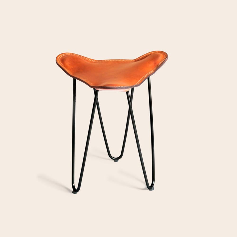 Hazelnut and Black Trifolium Stool by OxDenmarq
Dimensions: D 40 x W 40 x H 45 cm
Materials: Leather, Steel
Also Available: Different colors and other frame color available,

OX DENMARQ is a Danish design brand aspiring to make beautiful