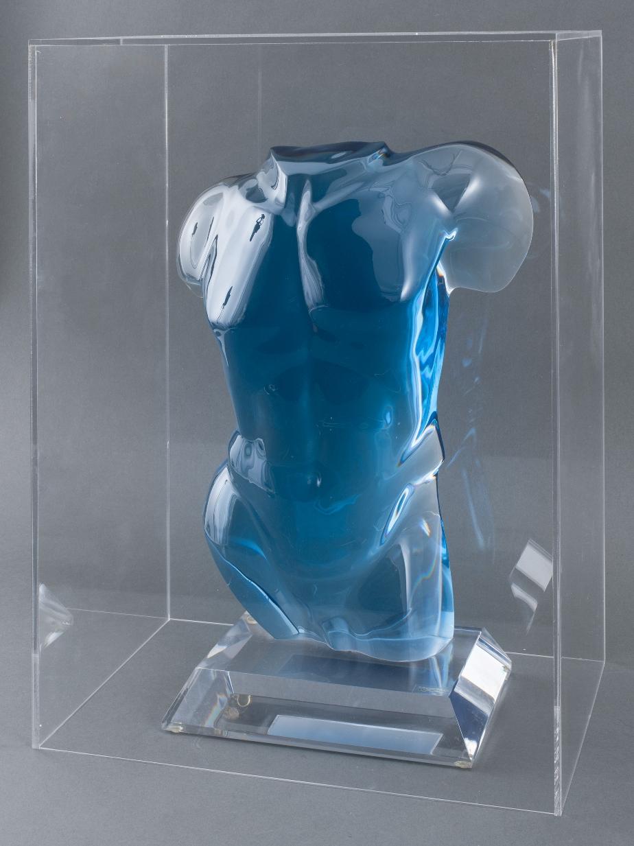 Haziza blue lucite male nude sculpture with lucite display cover. Made in the 1980s. Haziza logo is on the base. A custom lucite display cover was made to protect the sculpture. Signed on base.

Cover Dimensions: 18