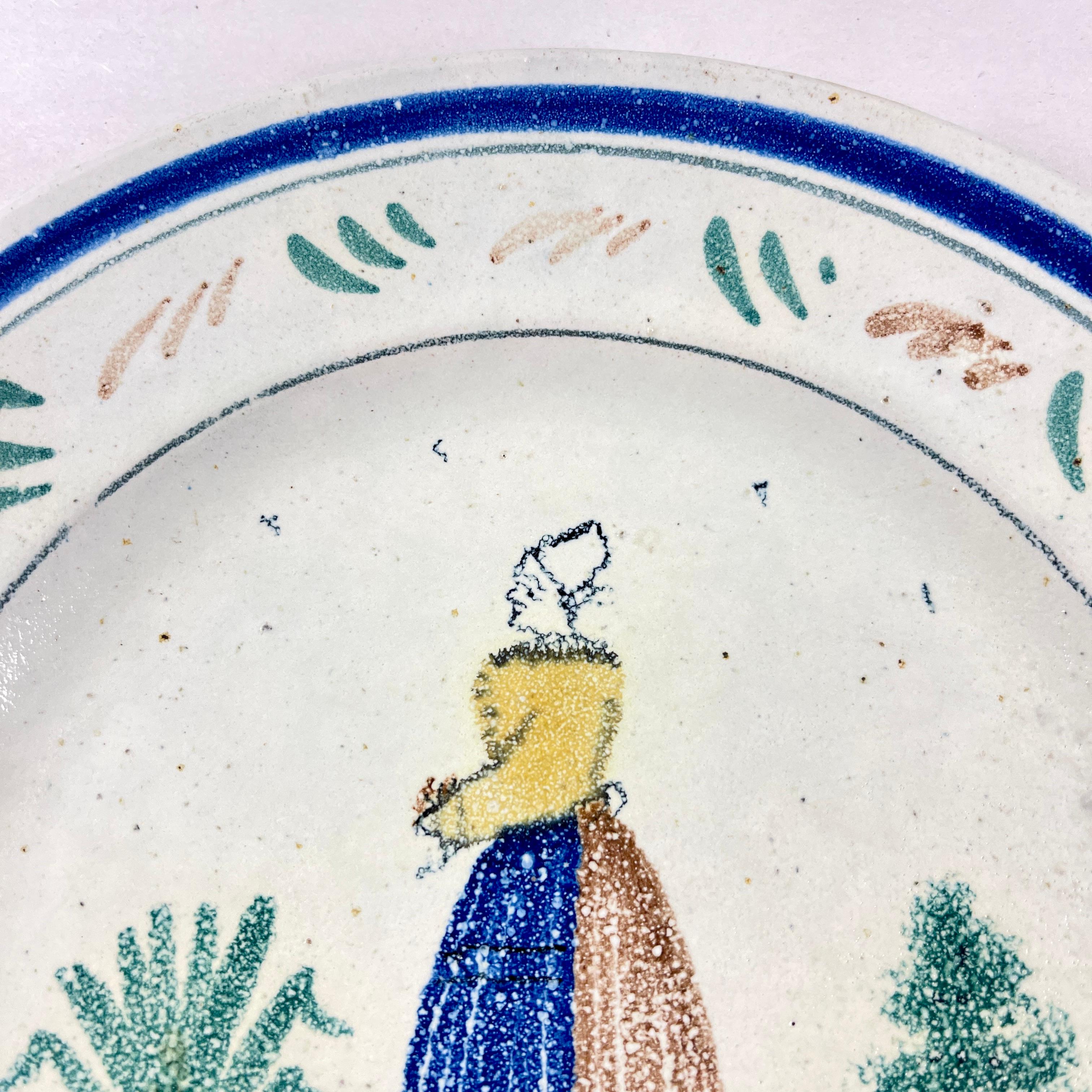 HB Quimper Grande Maison Mujer bretona con vestido amarillo, azul y marrón - hacia 1910 Francés