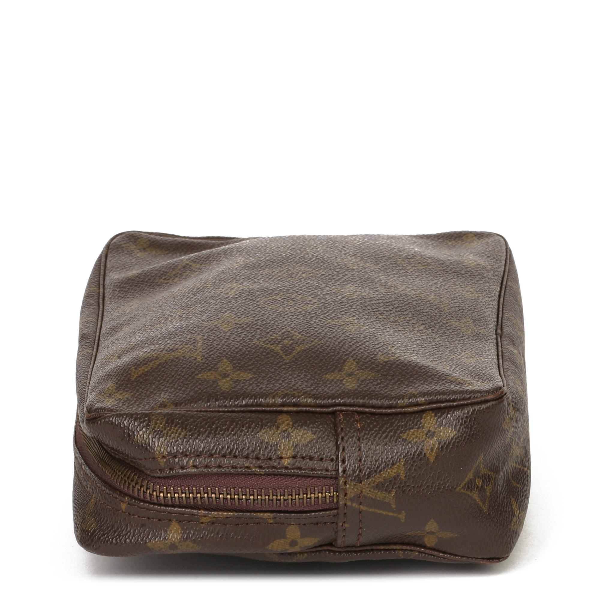 LOUIS VUITTON
Brown Monogram Coated Canvas Vintage Trousse Toilette 23

Xupes Reference: HB3734
Serial Number: 834
Age (Circa): 1984
Authenticity Details: Date Stamp (Made in France) 
Gender: Unisex
Type: Accessory, Travel, Clutch

Colour: