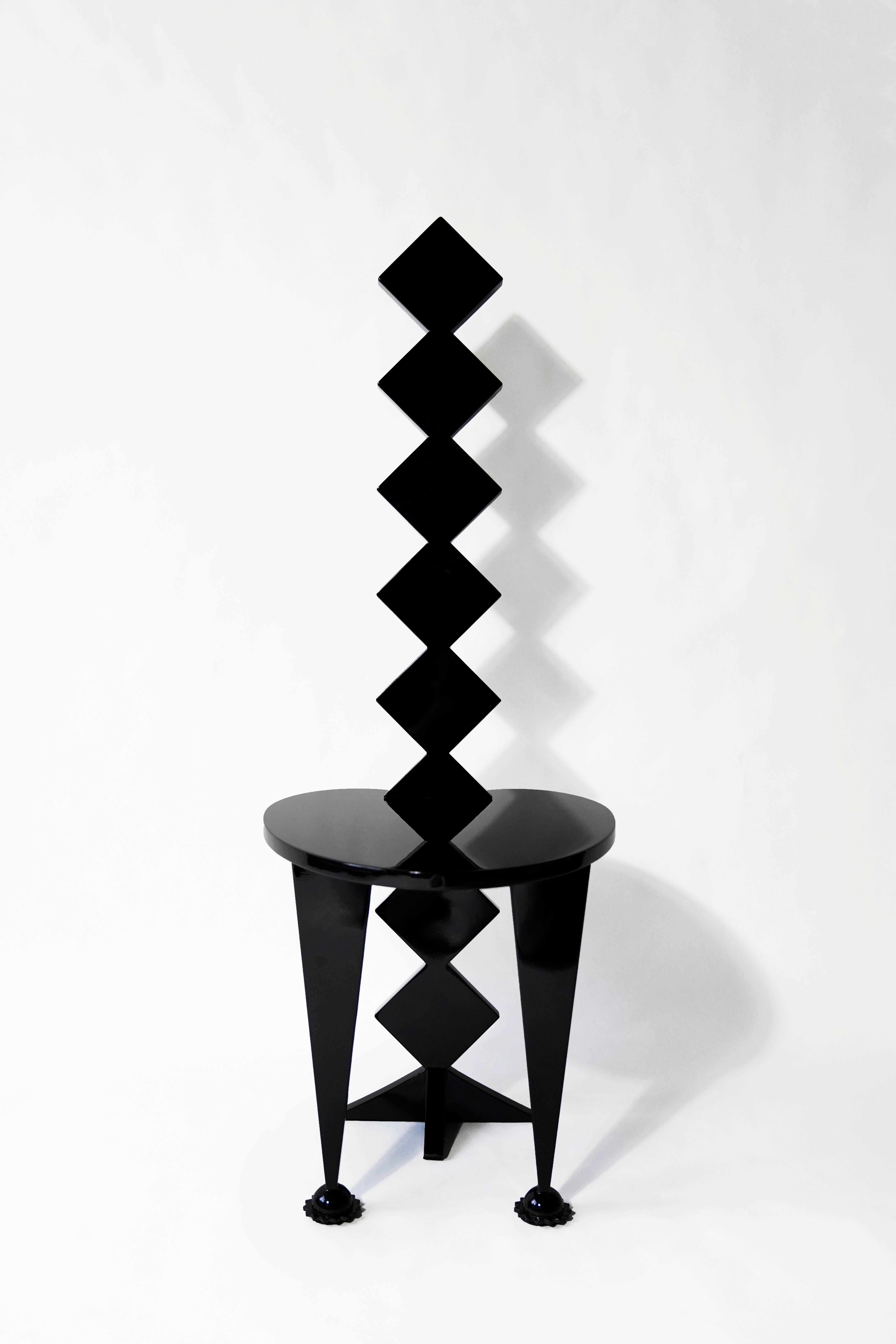 He Fade Away all black chair by The Shaw
Dimensions: D45 x W 54 x H129 cm
Materials: Stainless Steel, Wood

HE FADE AWAY high-backed chair is a stage play released by THESHAW 2021 in which red and black overlap. The day is overcast, torrential