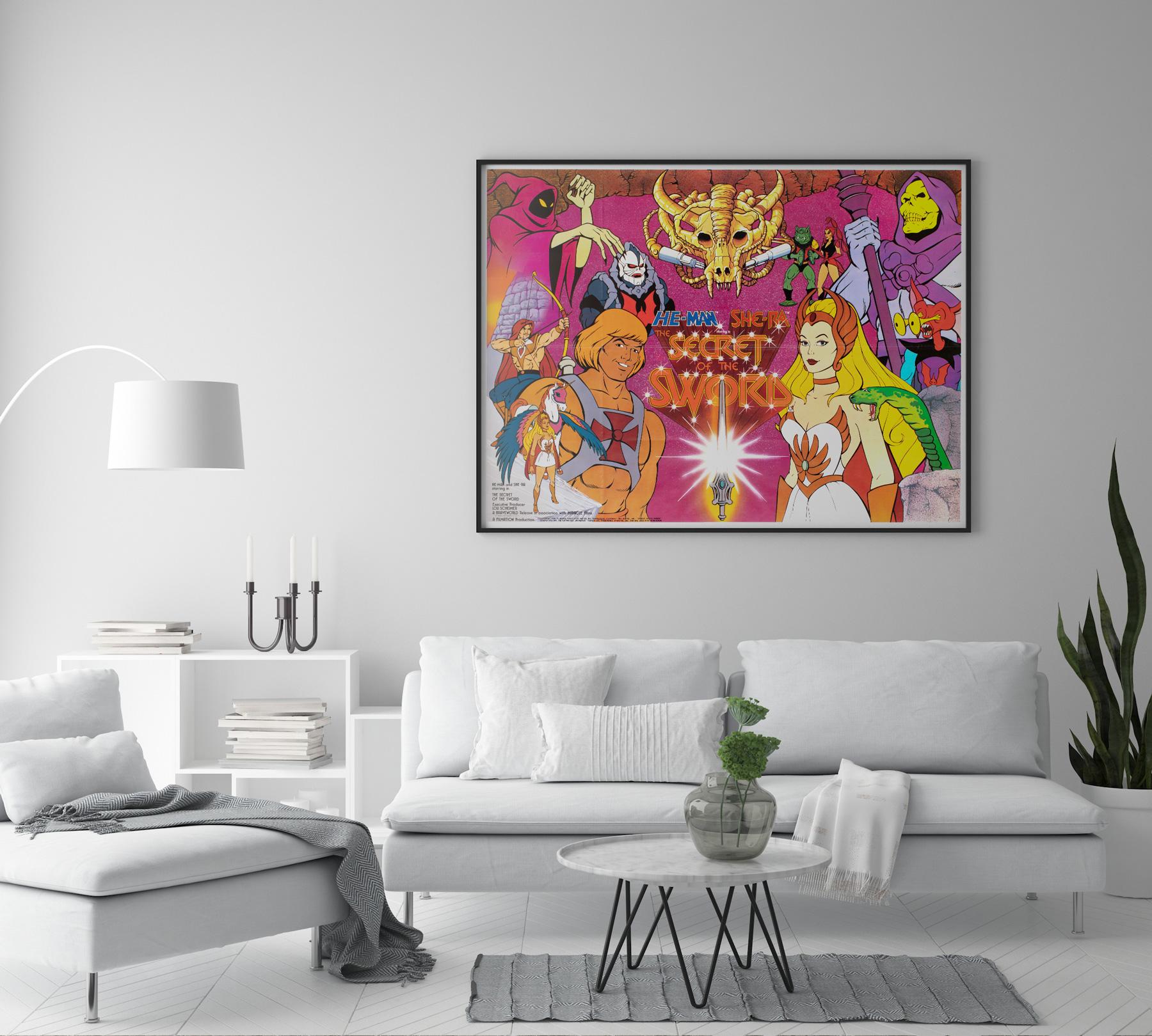 By the power of Grayskulf this poster has the power to delight and amaze! This original British film poster for He-Man and She-Ra's The Secret of the Sword is a wonderfully nostalgic piece.

This vintage movie poster is sized 30 x 39 3/4 inches
