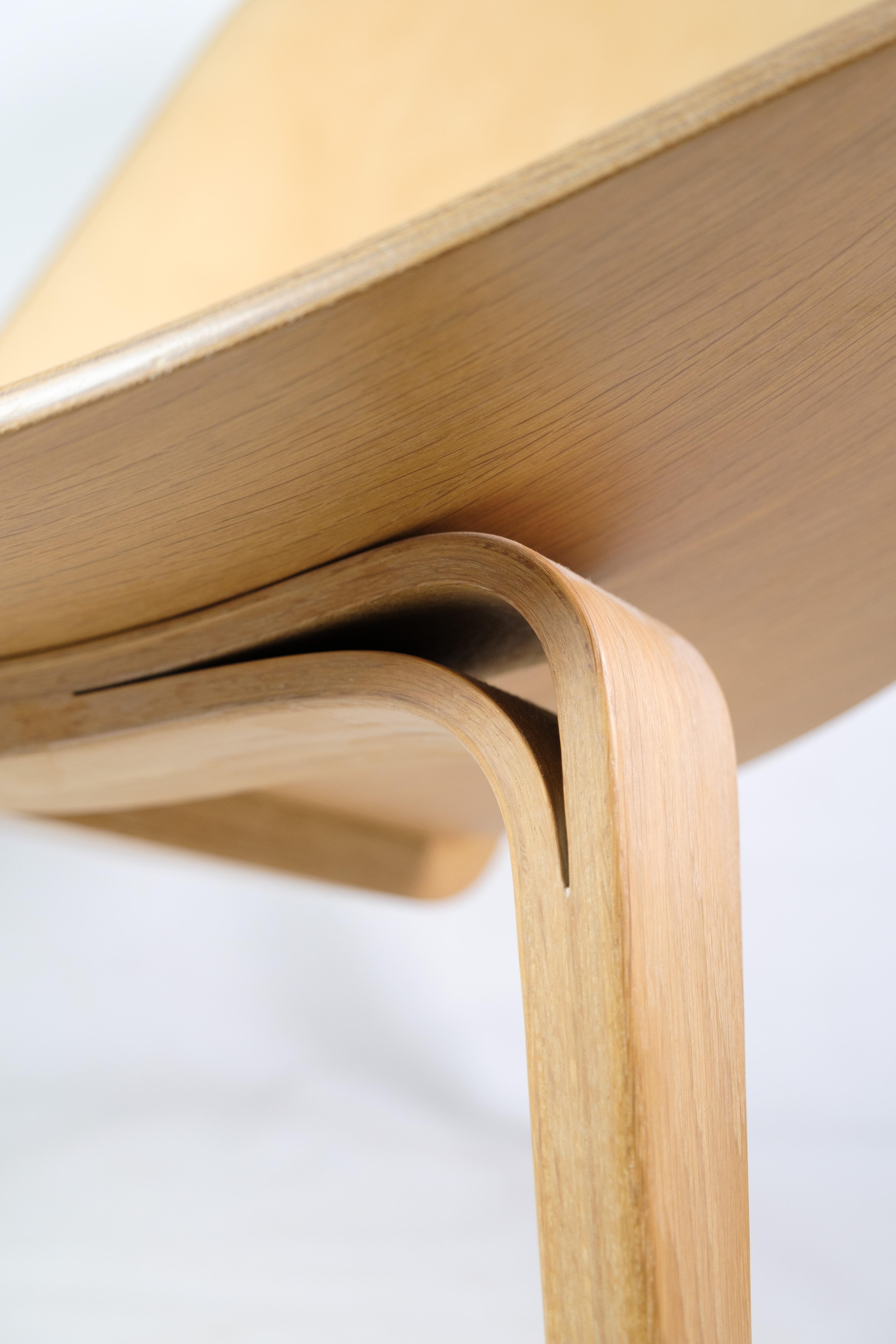 Contemporary he shell chair model CH07, designed by Hans J. Wegner, made of oak from 2007