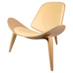 he shell chair model CH07, designed by Hans J. Wegner, made of oak from 2007