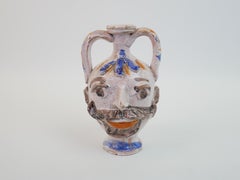 Head ceramic sculpture of candle holder