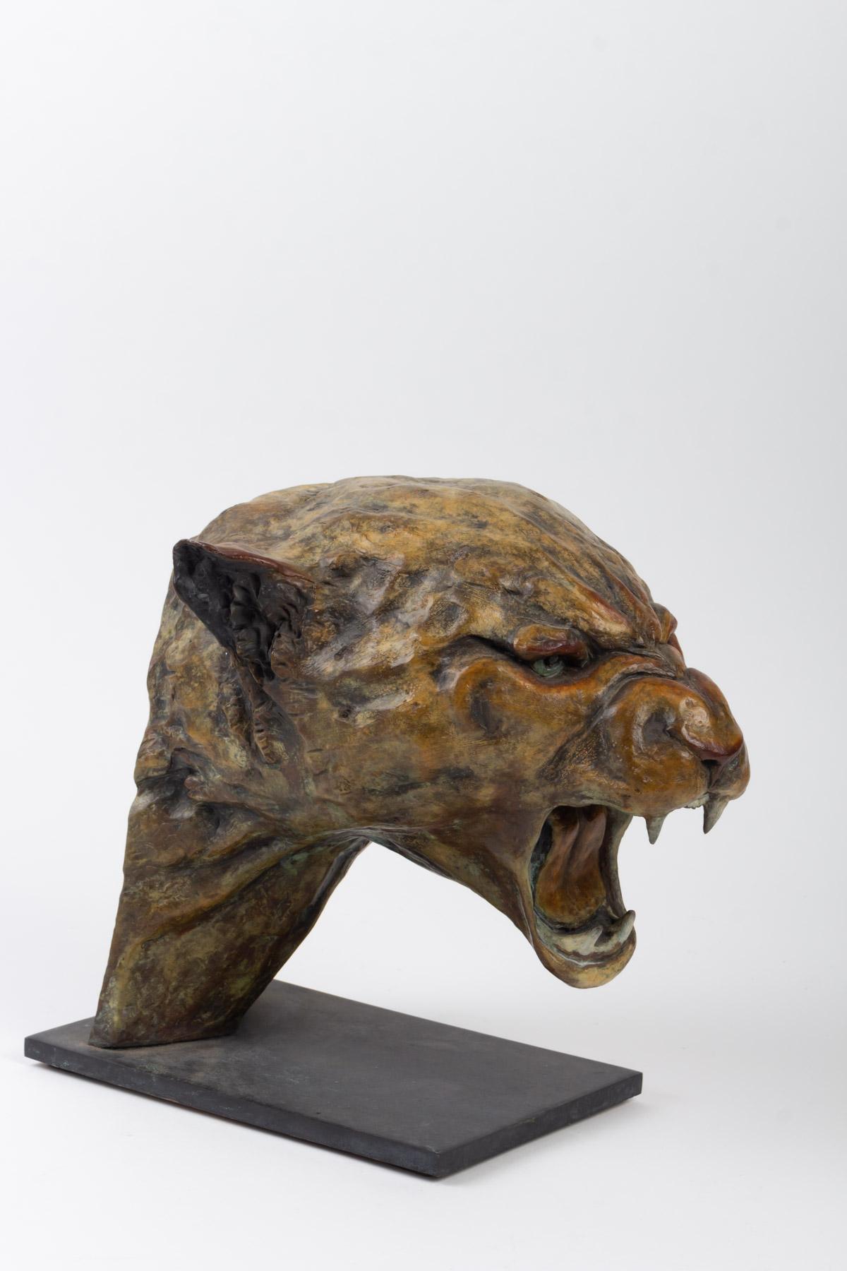 Head of a feline, patinated bronze 8/8, artist Jean Vassil.
Measures: H 26cm, W 22cm, D 30cm.