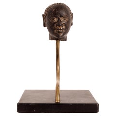 Head of a man in black granite, iron base, Russia, early 18th century.