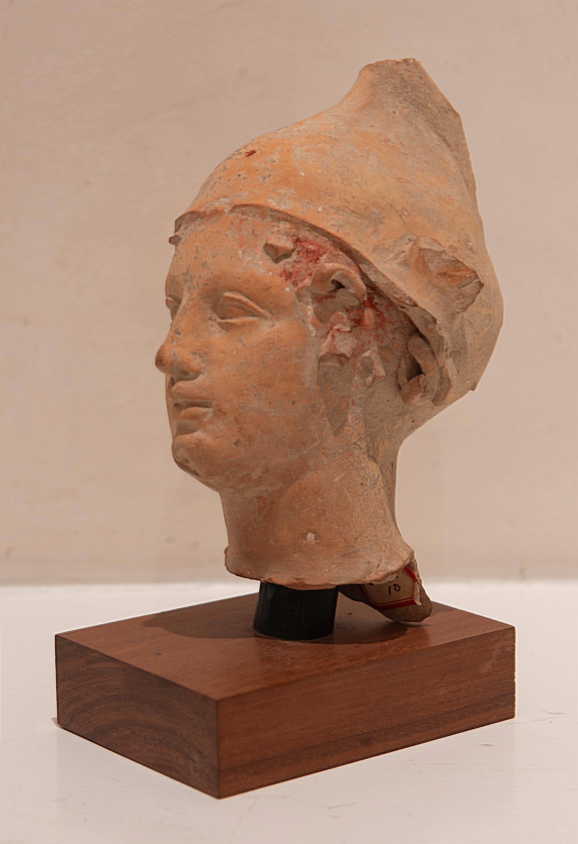 Small terracotta head.