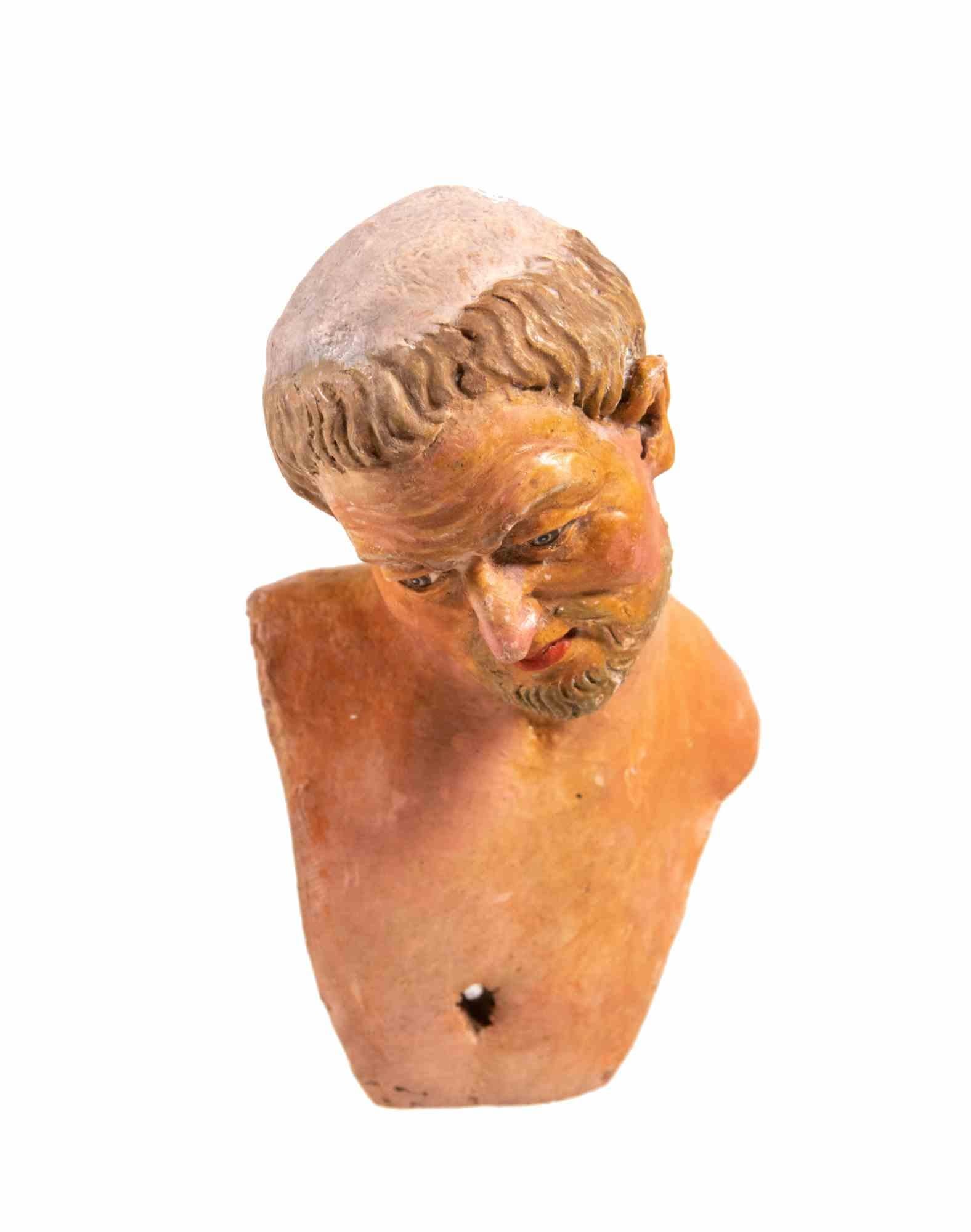 Testa di uomo realizzata in ceramica policroma con occhi in vetro.

Napoli, XVIII secolo.