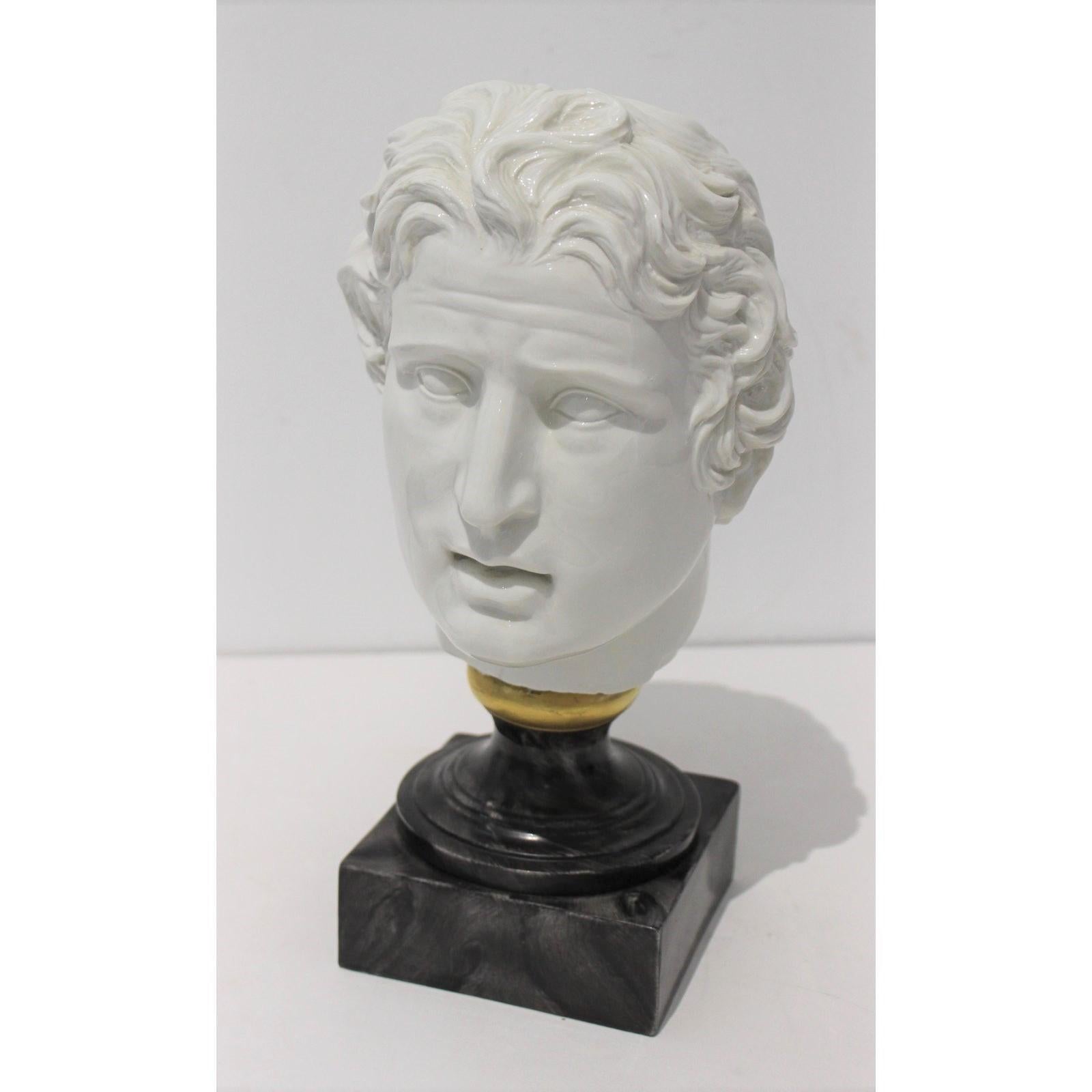 Evocative Mid-Century Modern Roman Head of male in white porcelain on faux malachite stand from a Palm Beach estate.

Square base measures 4 1/2 x 4 1/2 x 1 3/4 high.
