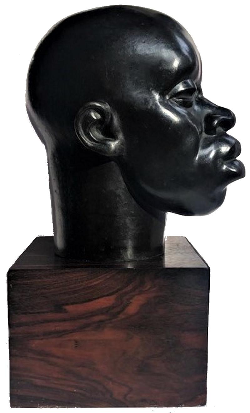 The sculpture presented here - The Head of a Senegalese Man - was created in the ‘Négritude’ style and is an exemplary to this movement in French Art Deco visual arts. 

A spectator’s attention is mostly drawn to the proud position of the man's