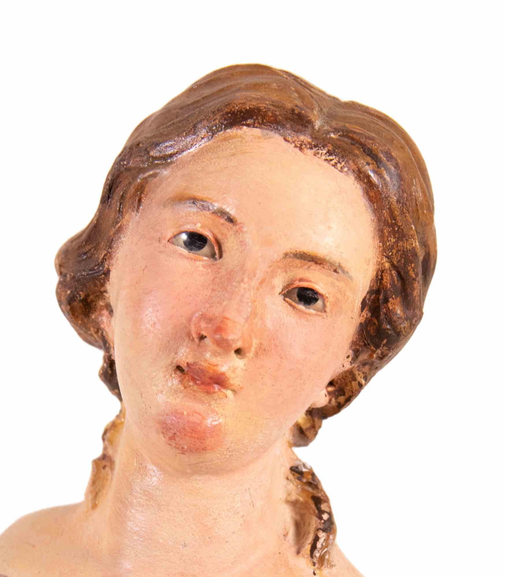 Testa di donna uomo realizzata in ceramica policroma con occhi in vetro.

Napoli, XVIII secolo.

Ottime condizioni. 
