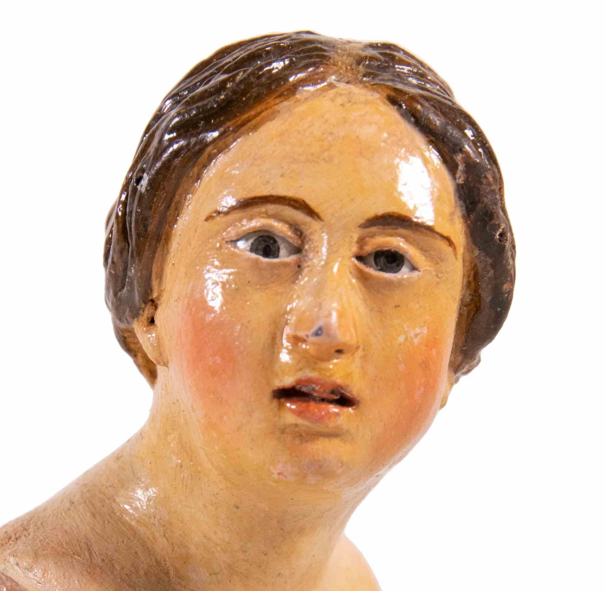 Testa di donna uomo realizzata in ceramica policroma con occhi in vetro.

Napoli, XVIII secolo.