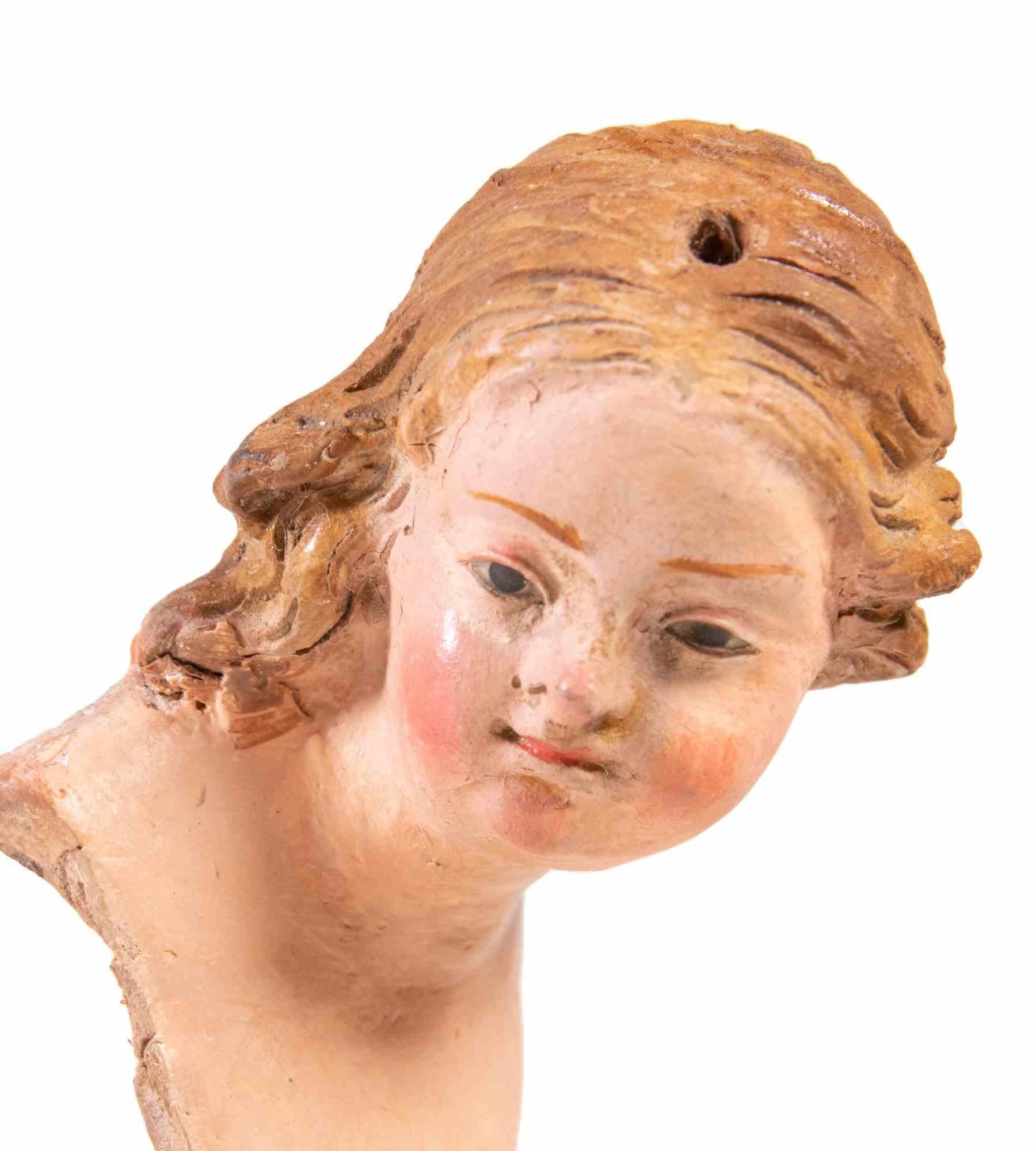 Testa di ragazza realizzata in ceramica policroma con occhi in vetro.

Napoli, XVIII secolo.

Ottime condizioni. 