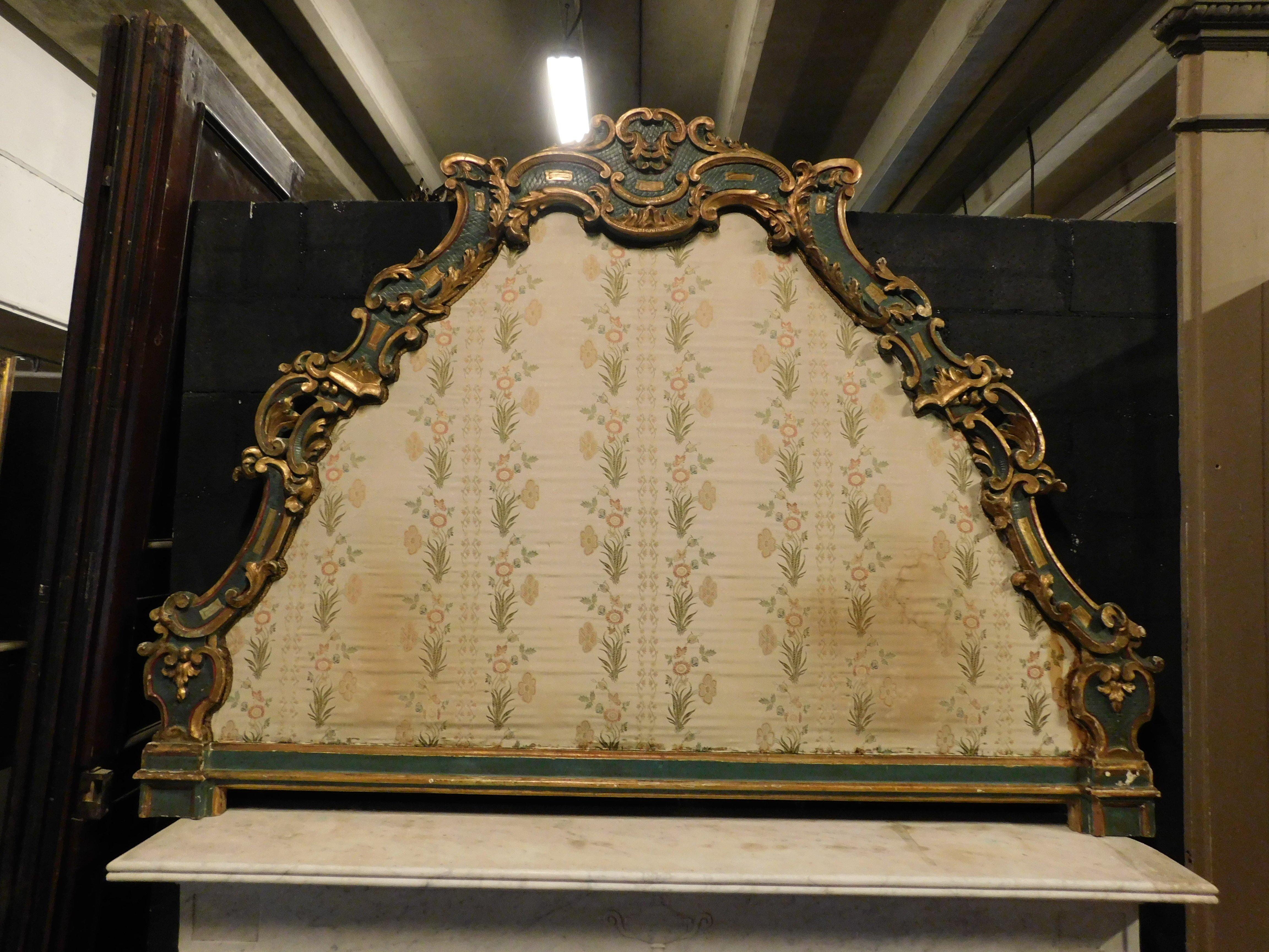 Antique Headboard, headrest bed frame in green and gold lacquered wood, carved floral details and padded with original lining and fabric, with normal signs of wear due to the age of the piece, visible in the details of the photos, original from the