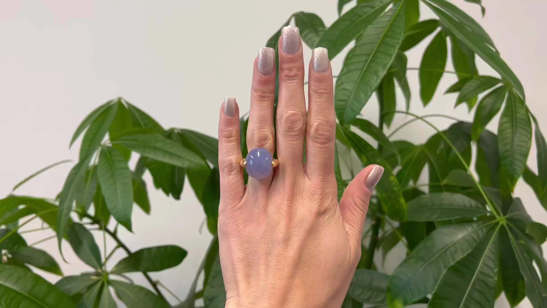 One Pomellato Italian 27.00 Carat Blue Chalcedony 18k Rose Gold Luna Ring. Featuring one cabochon cut blue chalcedony weighing approximately 27.00 carats. Crafted in 18 karat rose gold signed Pomellato with Italian hallmarks and purity marks. Circa