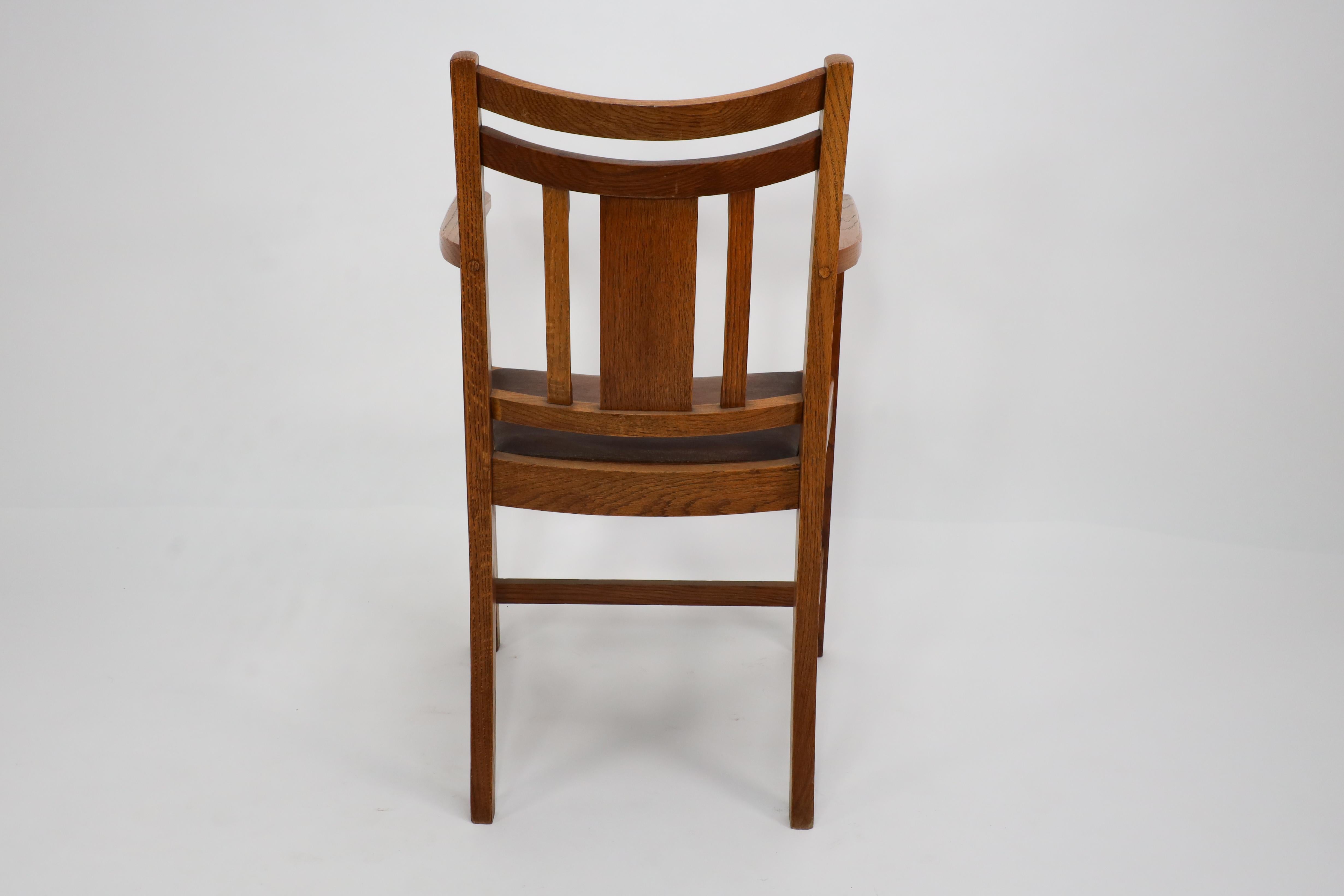 Heals. A good quality Arts and Crafts oak armchair with chamferred details For Sale 3