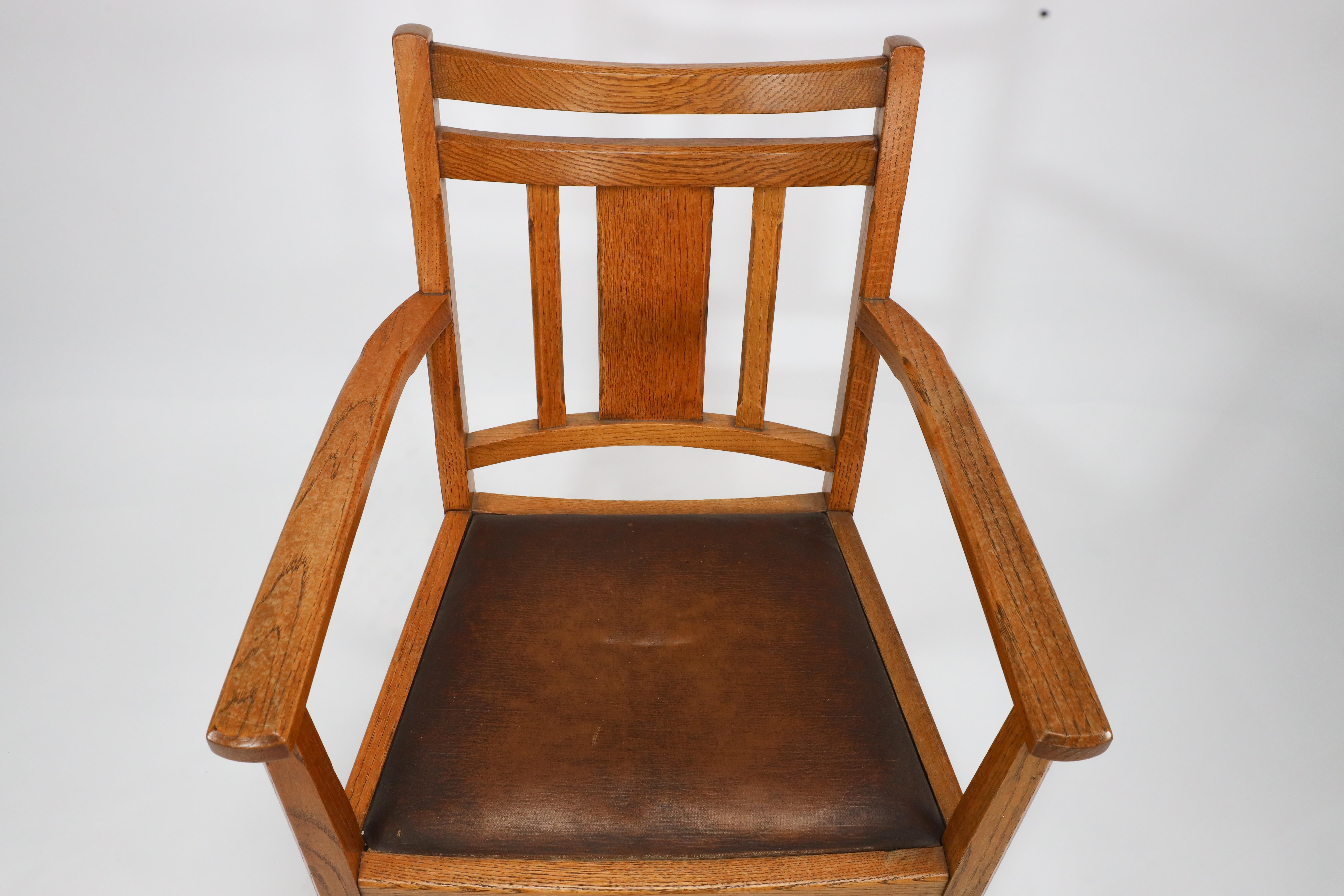 Heals. A good quality Arts and Crafts oak armchair with chamferred details For Sale 2