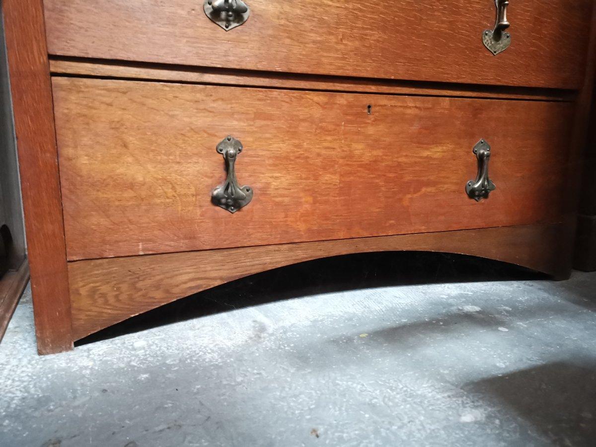 Late 19th Century Heals. An Arts and Crafts Oak Chest of Drawers, Stamped Heals of London