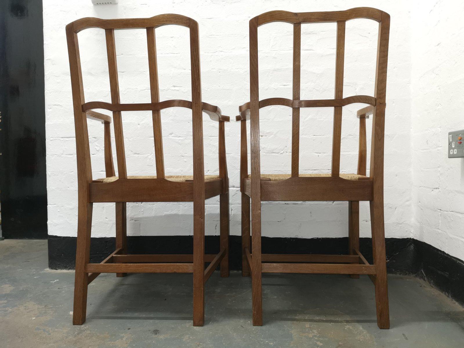 Arts and Crafts Pair of Cotswold School Arts & Crafts Oak Lattice Back Armchairs with rush Seats For Sale