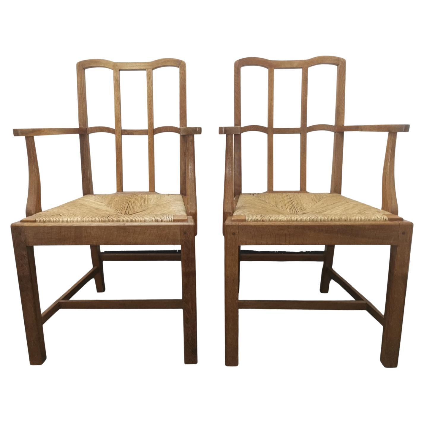 Pair of Cotswold School Arts & Crafts Oak Lattice Back Armchairs with rush Seats