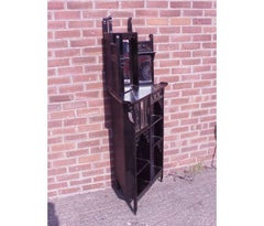 Heals, Attributed an Anglo-Japanese Aesthetic Movement Butterfly Corner Cabinet