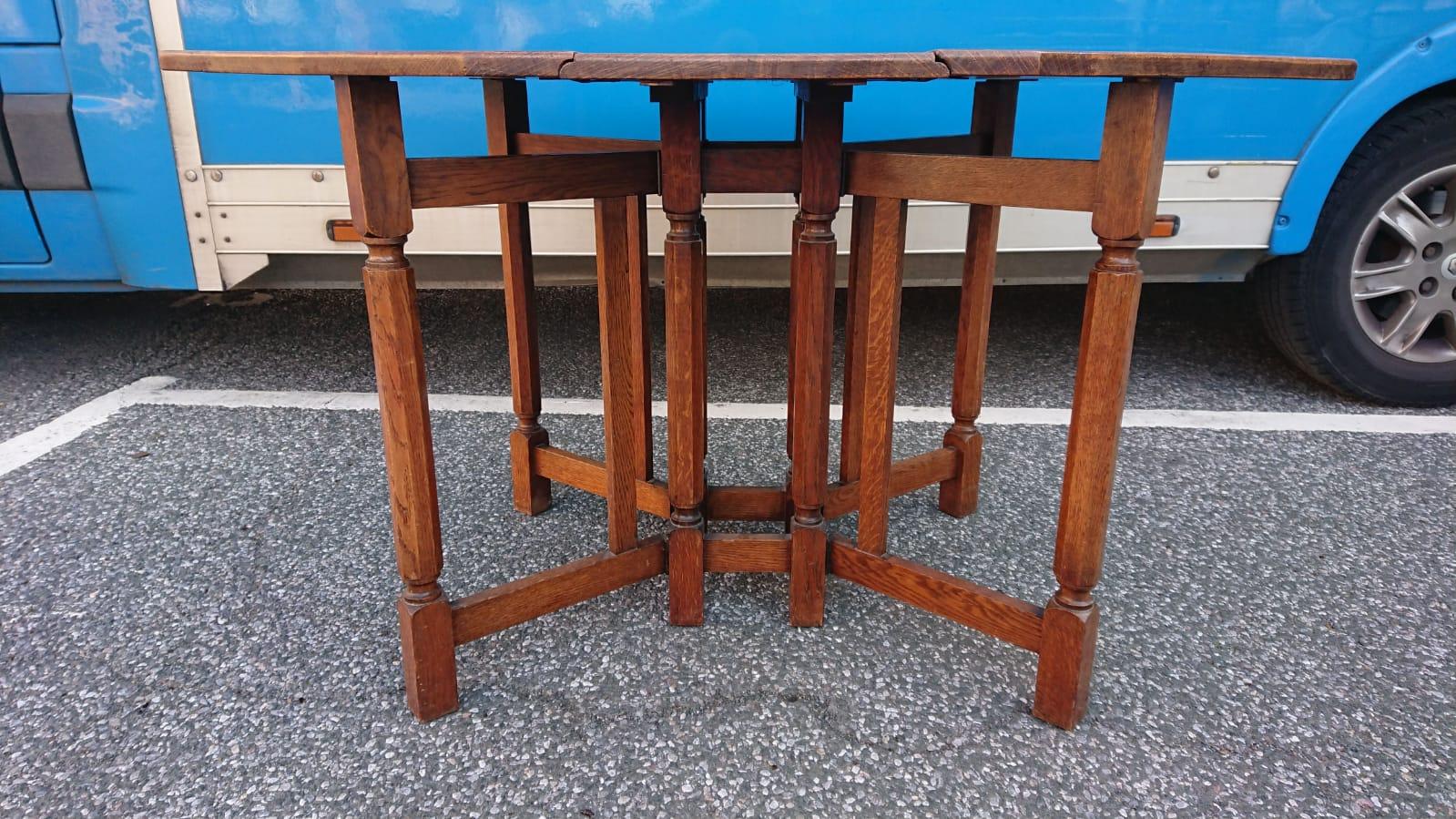 Hand-Crafted Heals, Attributed, An English Arts & Crafts Oak Drop Leaf Hexagonal Dining Table For Sale