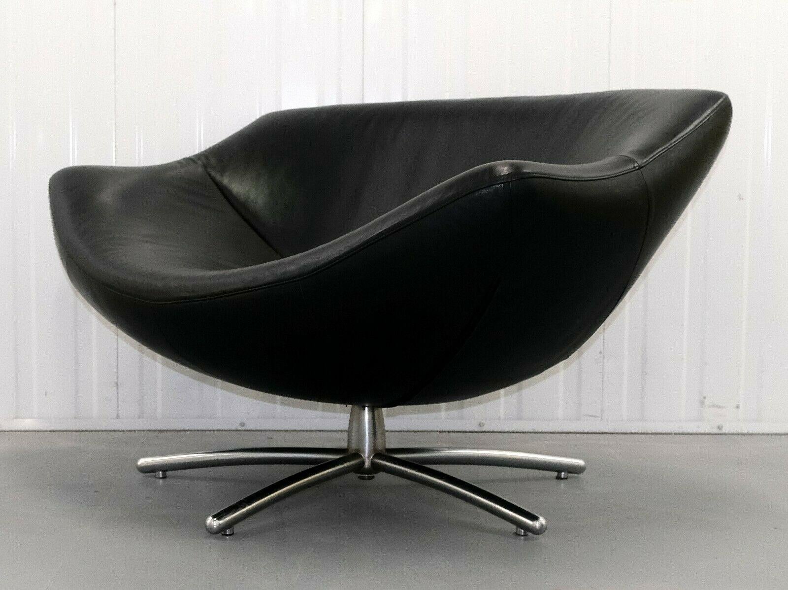 We are delighted to offer for sale this stunning Heals Gerard Van Den Berg black leather swivel armchair. 

This comfortable and stylish egg shape armchair will compliment any room as the design is simple yet eye catching. The soft leather (which