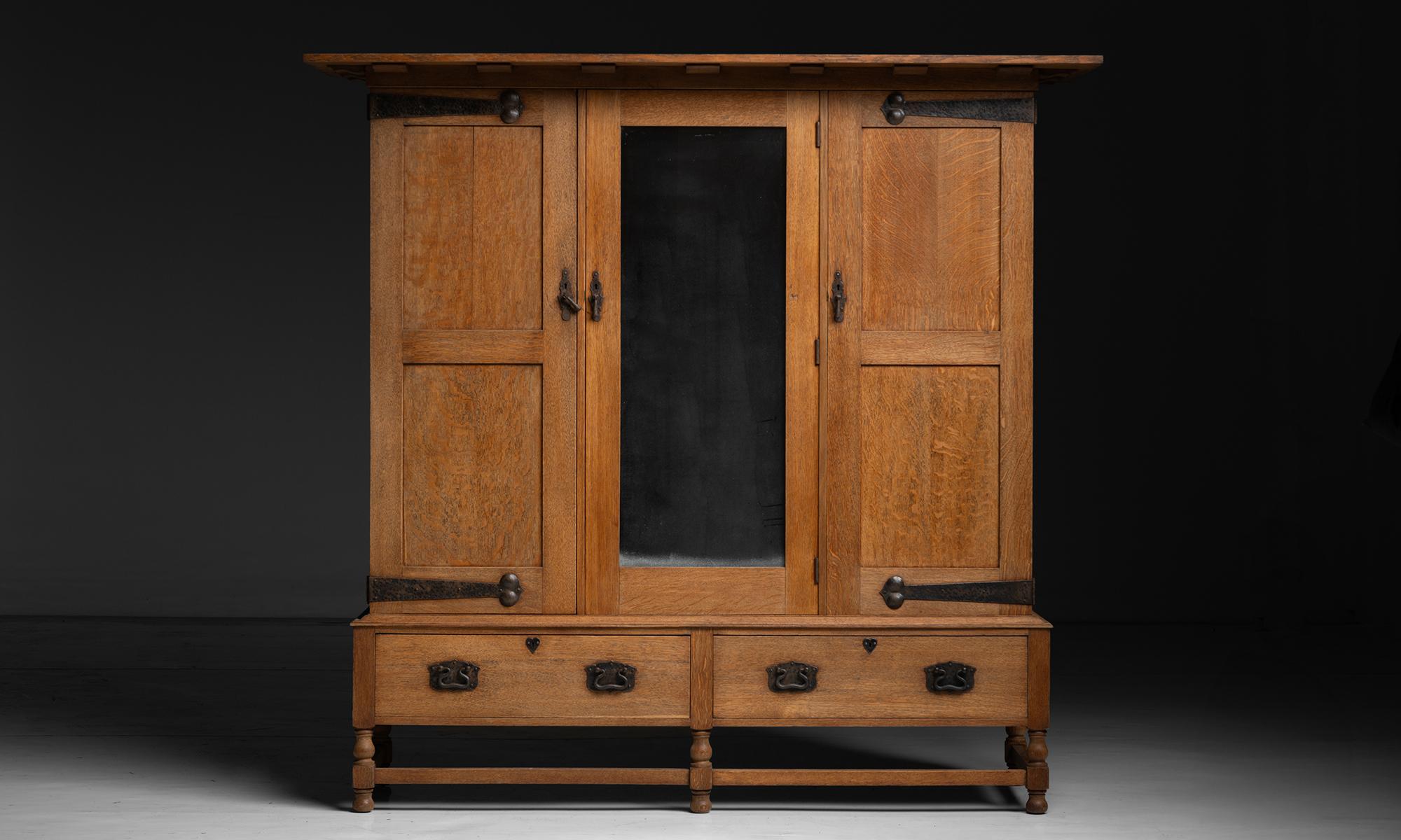 Heals Oak Wardrobe

England circa 1880

Finely made oak wardrobe with original iron hardware from the Guild of Handicraft.

81”w x 26.5”d x 77.75”h