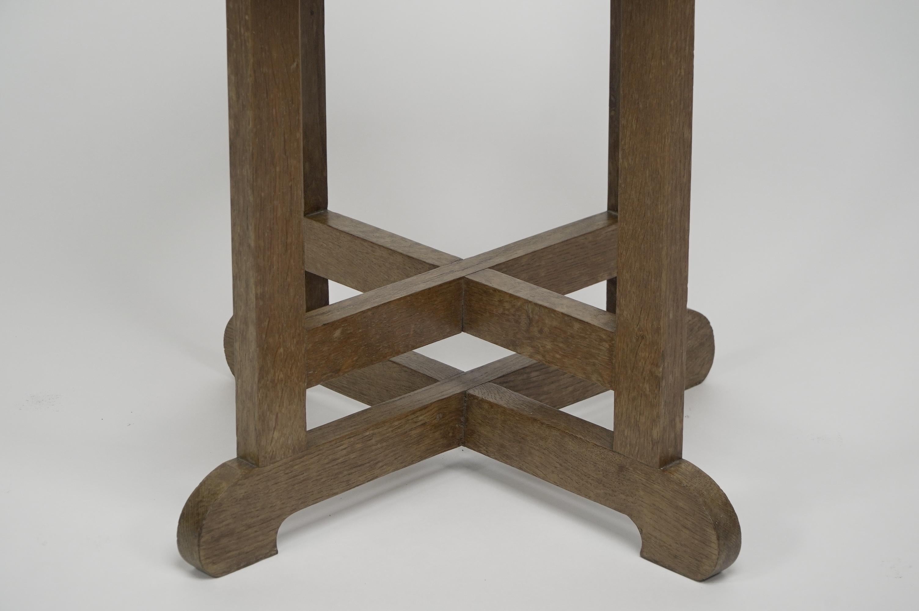 Oak Heals of London in the style of. An oak circular oak side or occasional table. For Sale