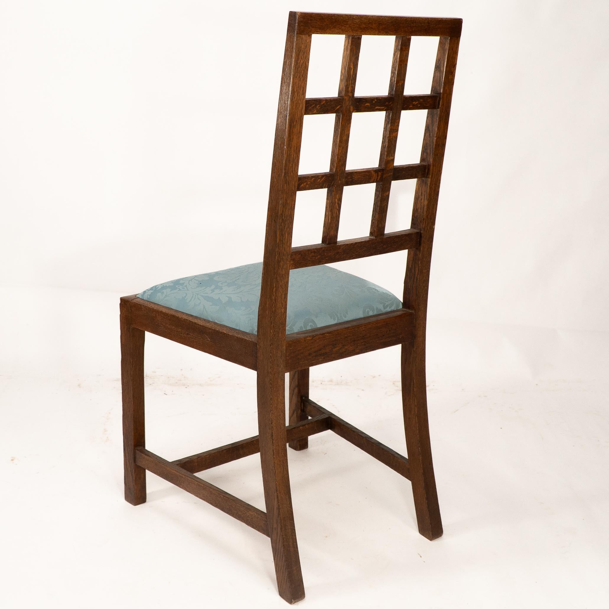 Heals. Set of 4 Arts & Crafts oak lattice back dining chairs & blue Damask seats For Sale 12