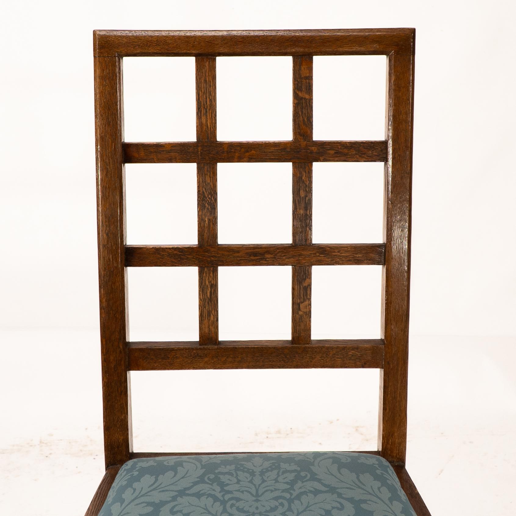Heals. Set of 4 Arts & Crafts oak lattice back dining chairs & blue Damask seats For Sale 2