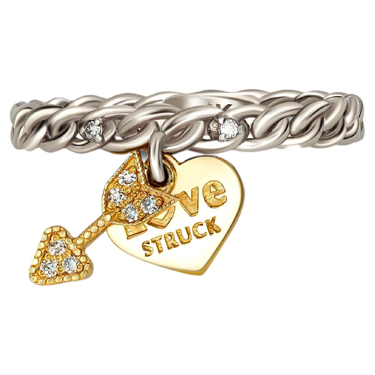 Heart and arrow 14k gold ring with diamonds. 