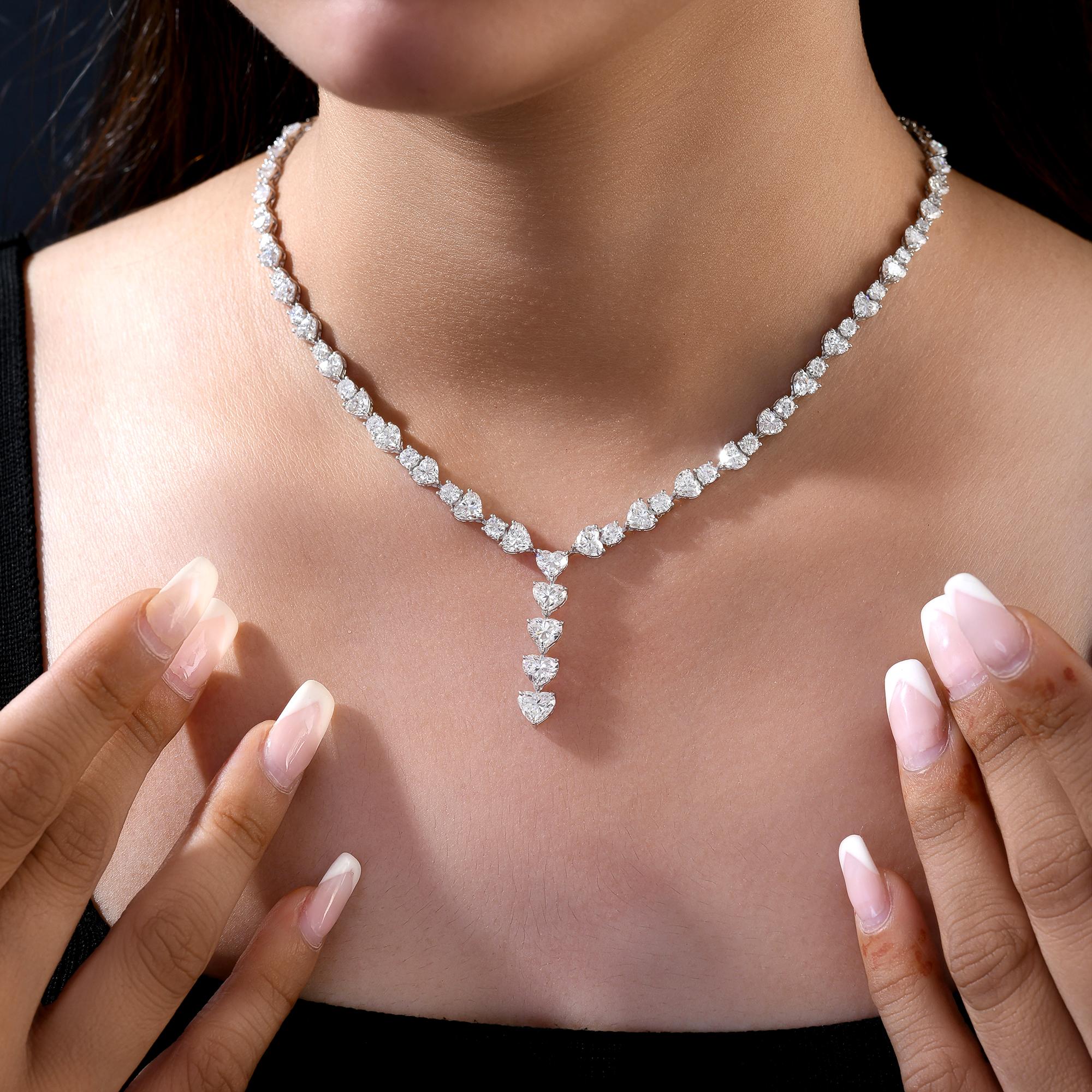 Collier pendentif diamant naturel en forme de coeur et rond en or blanc 18 carats Bijoux fins
Ce superbe collier de diamants en forme de goutte, conçu dans un gracieux design en Y, présente des diamants ronds et en forme de cœur parfaitement